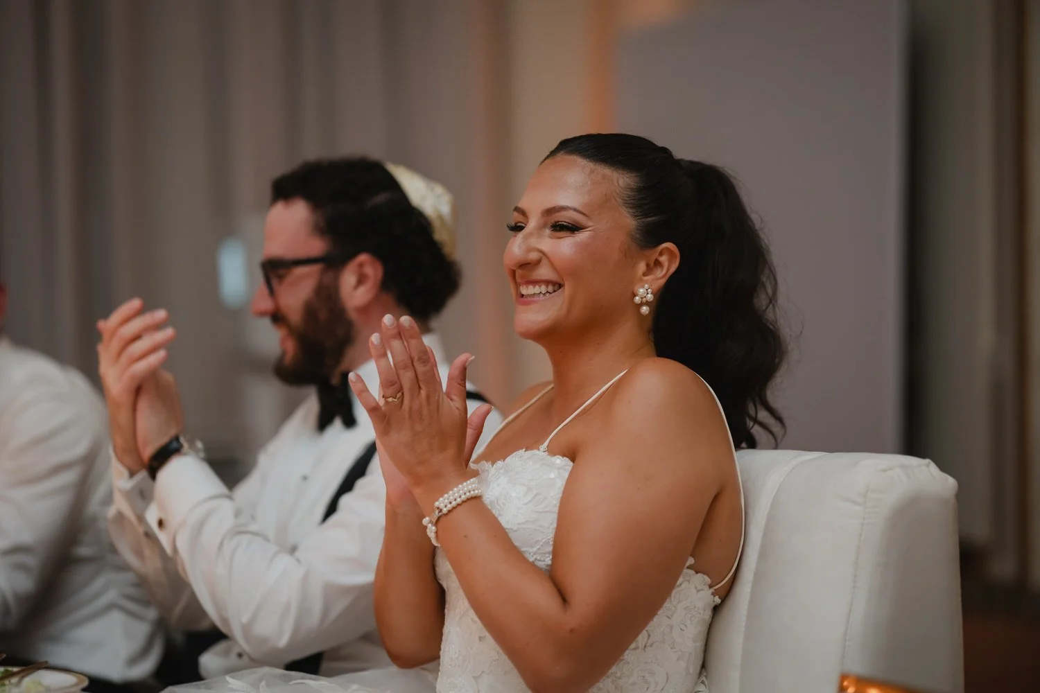 a wedding reception in the candle lit ball room at the chateau laurier