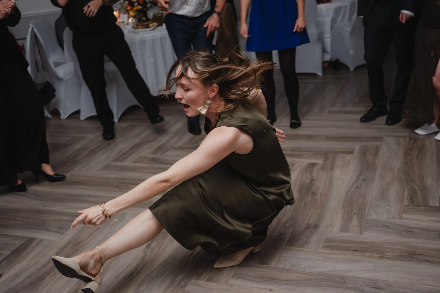 fun dancing photograph at a wedding reception