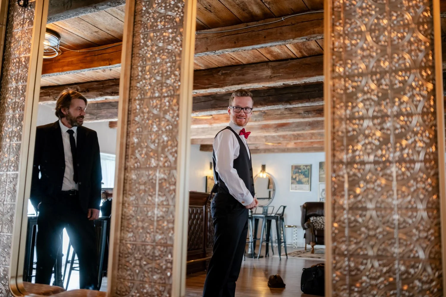 photo of a groom getting ready for his wedding at stonefields estate