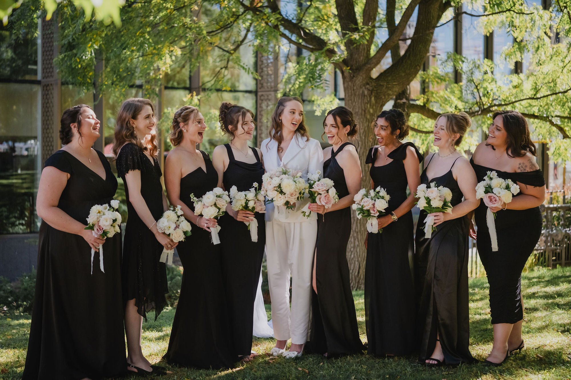 fun bridesmaids photo outside the national arts centre