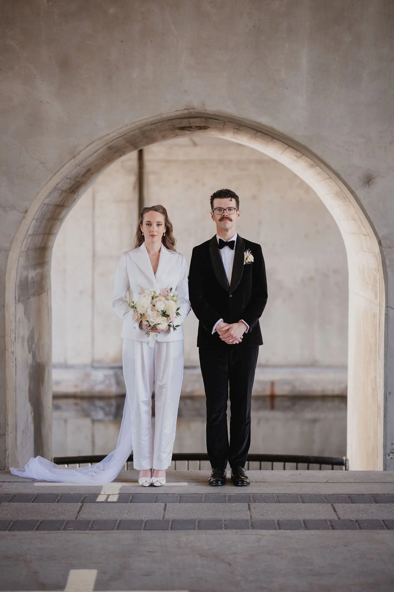 Wedding portrait of a married couple in Downtown Ottawa, near the canal.