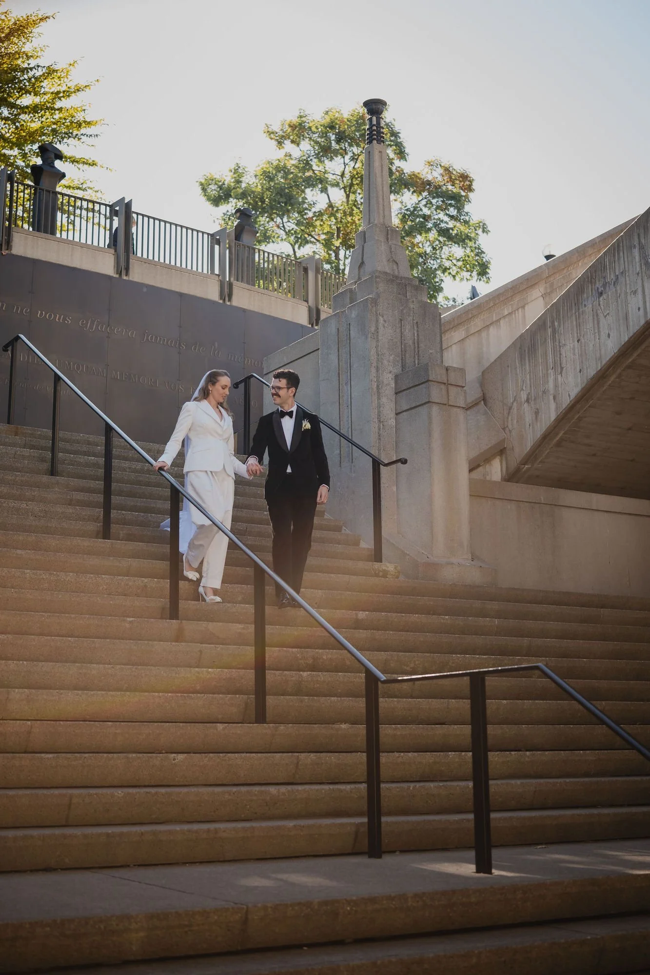 Wedding portrait of a married couple in Downtown Ottawa, near the canal.