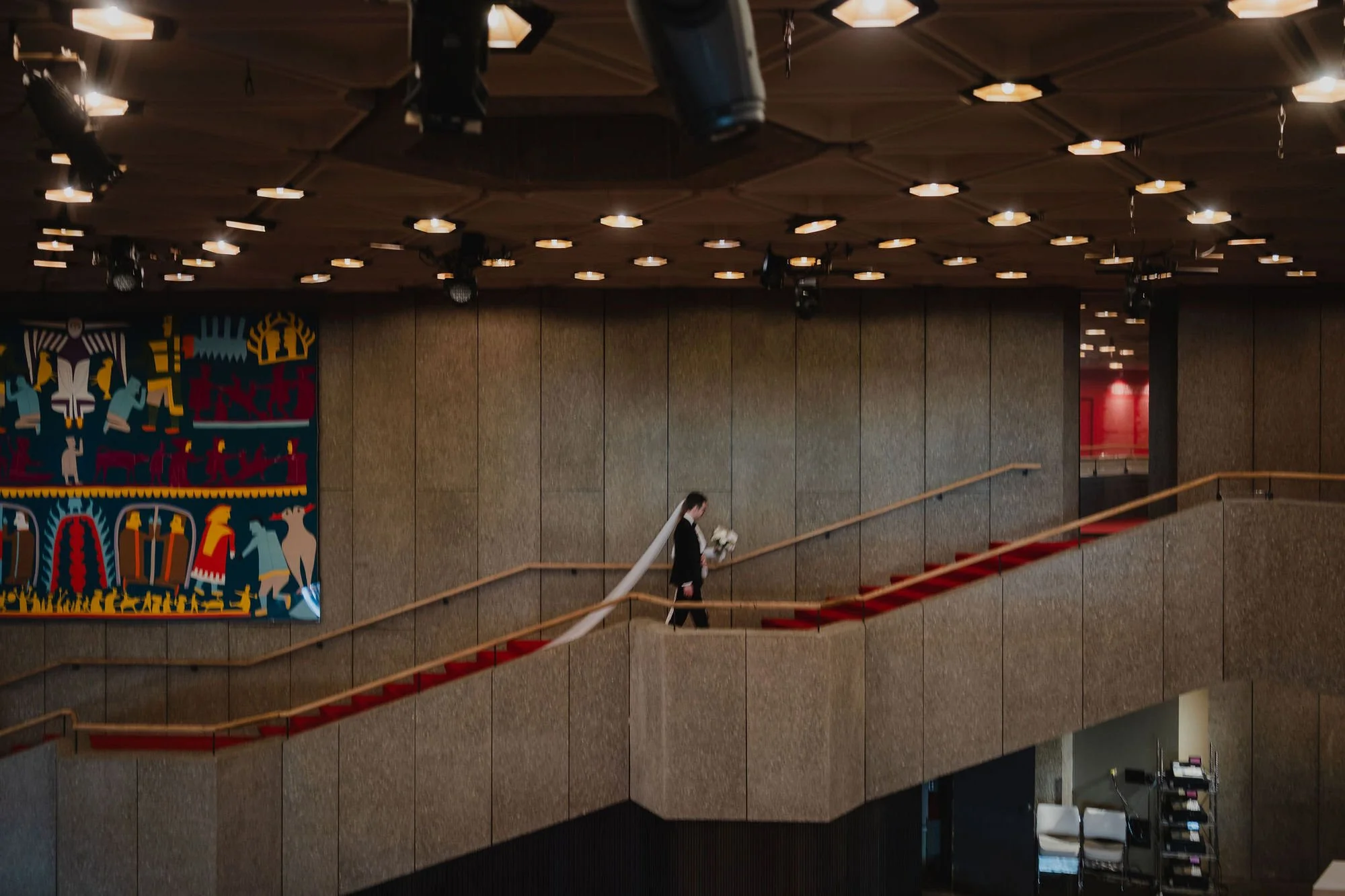 bride and groom walking to to their national arts centre wedding ceremony