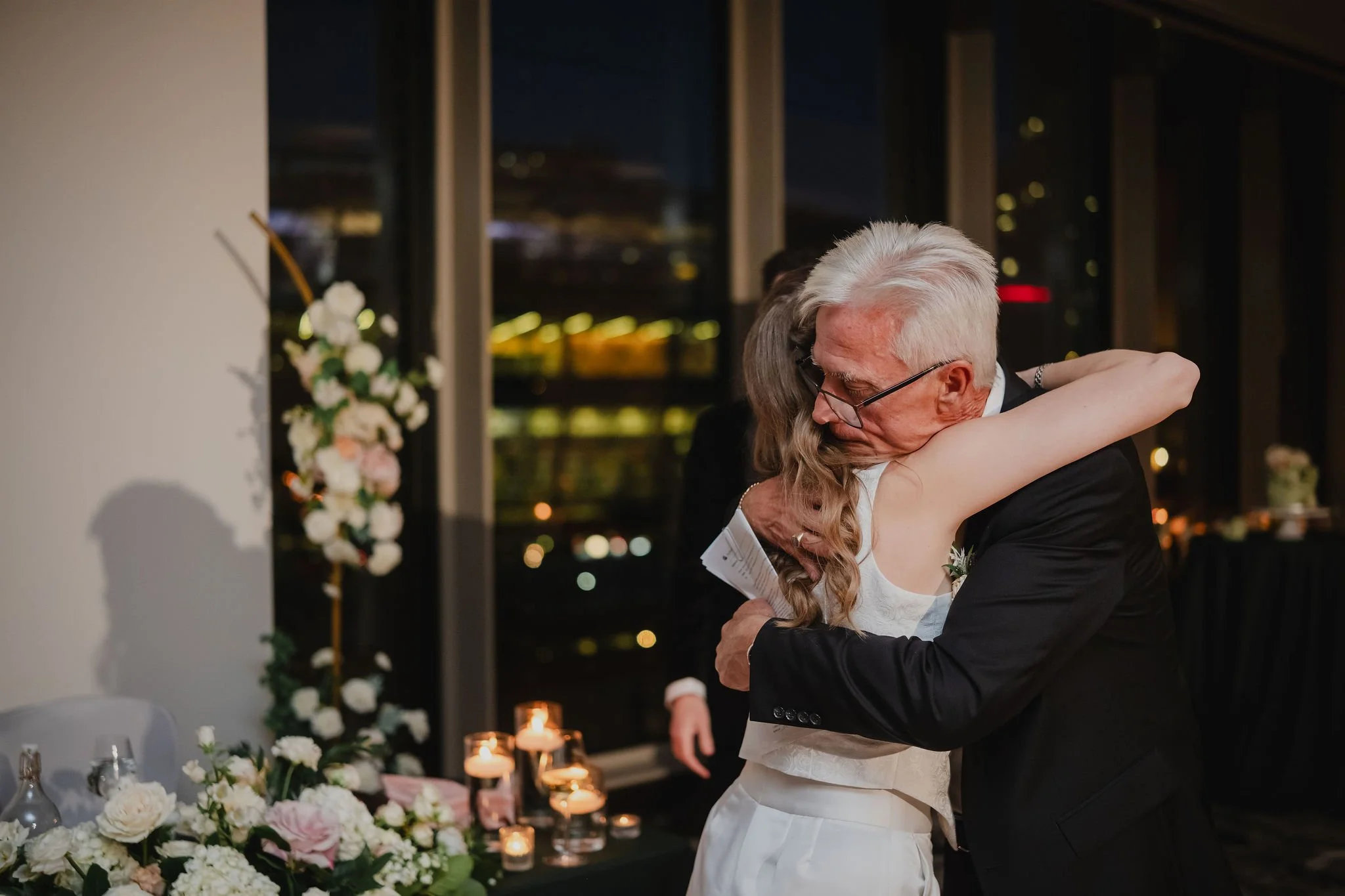 photo of someone giving a speech at a national arts centre wedding reception.