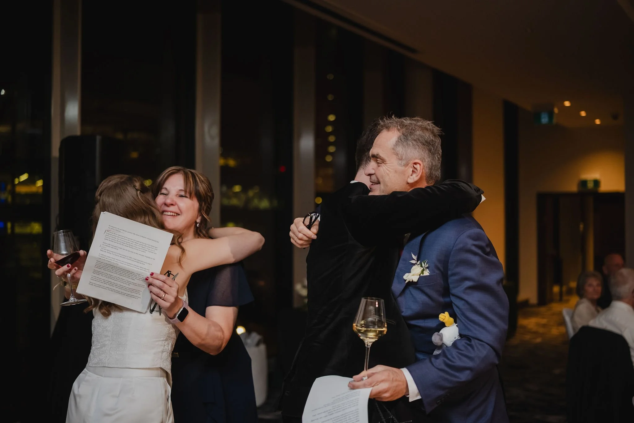 photo of someone giving a speech at a national arts centre wedding reception.