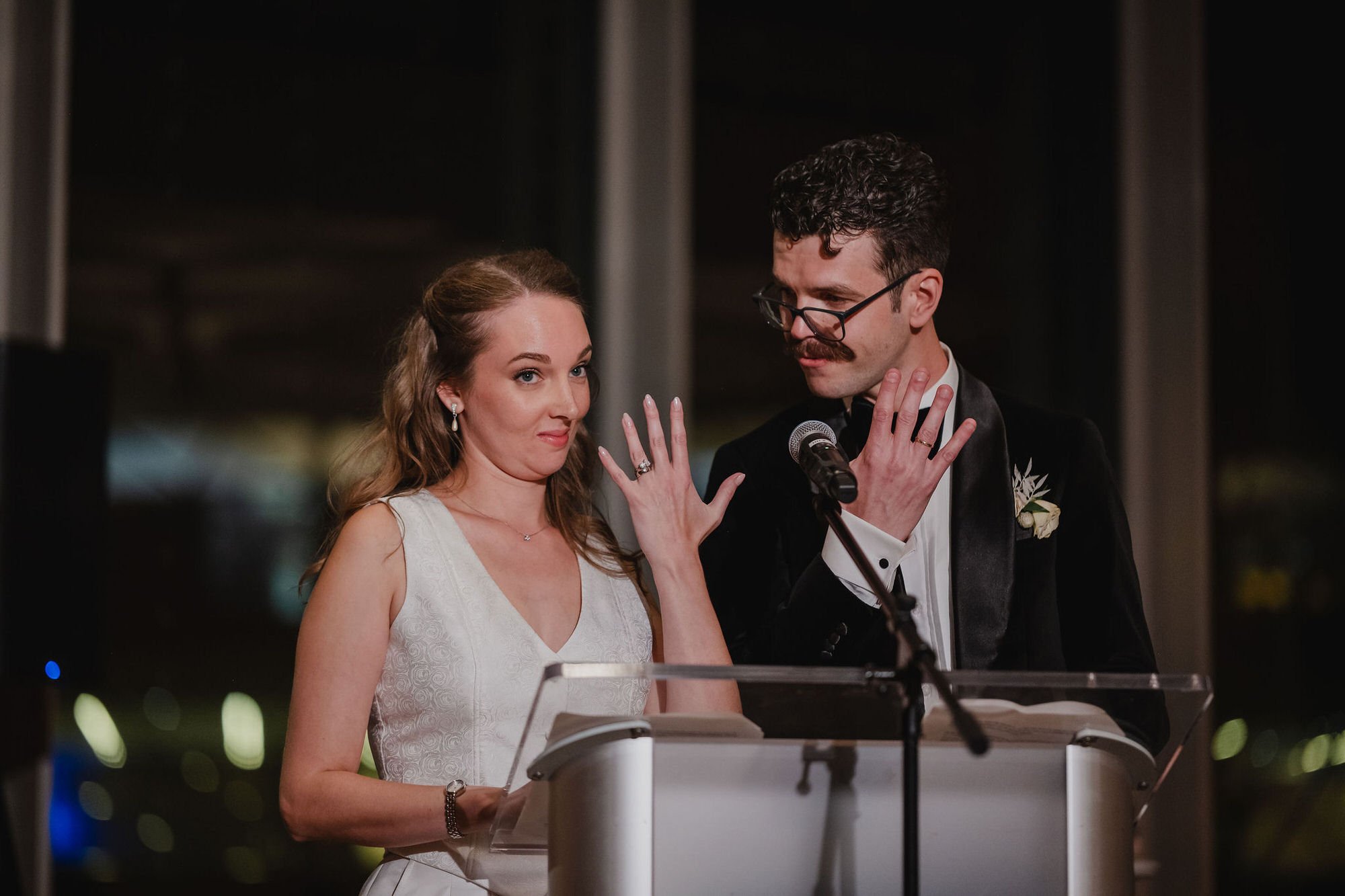 photo of someone giving a speech at a national arts centre wedding reception.