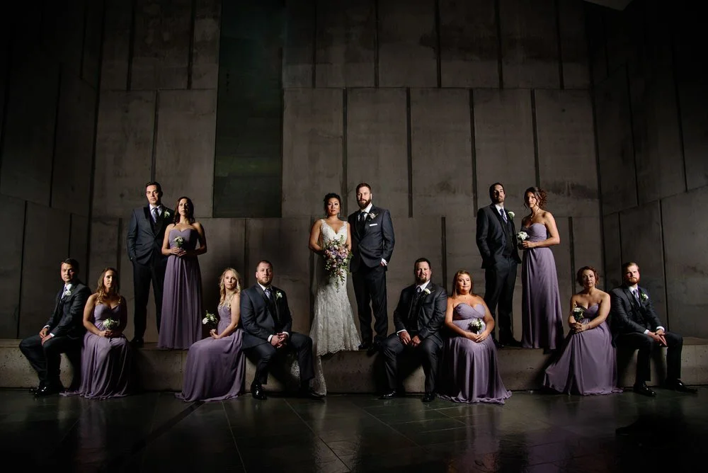 wedding party photograph with dramatic off camera lighting