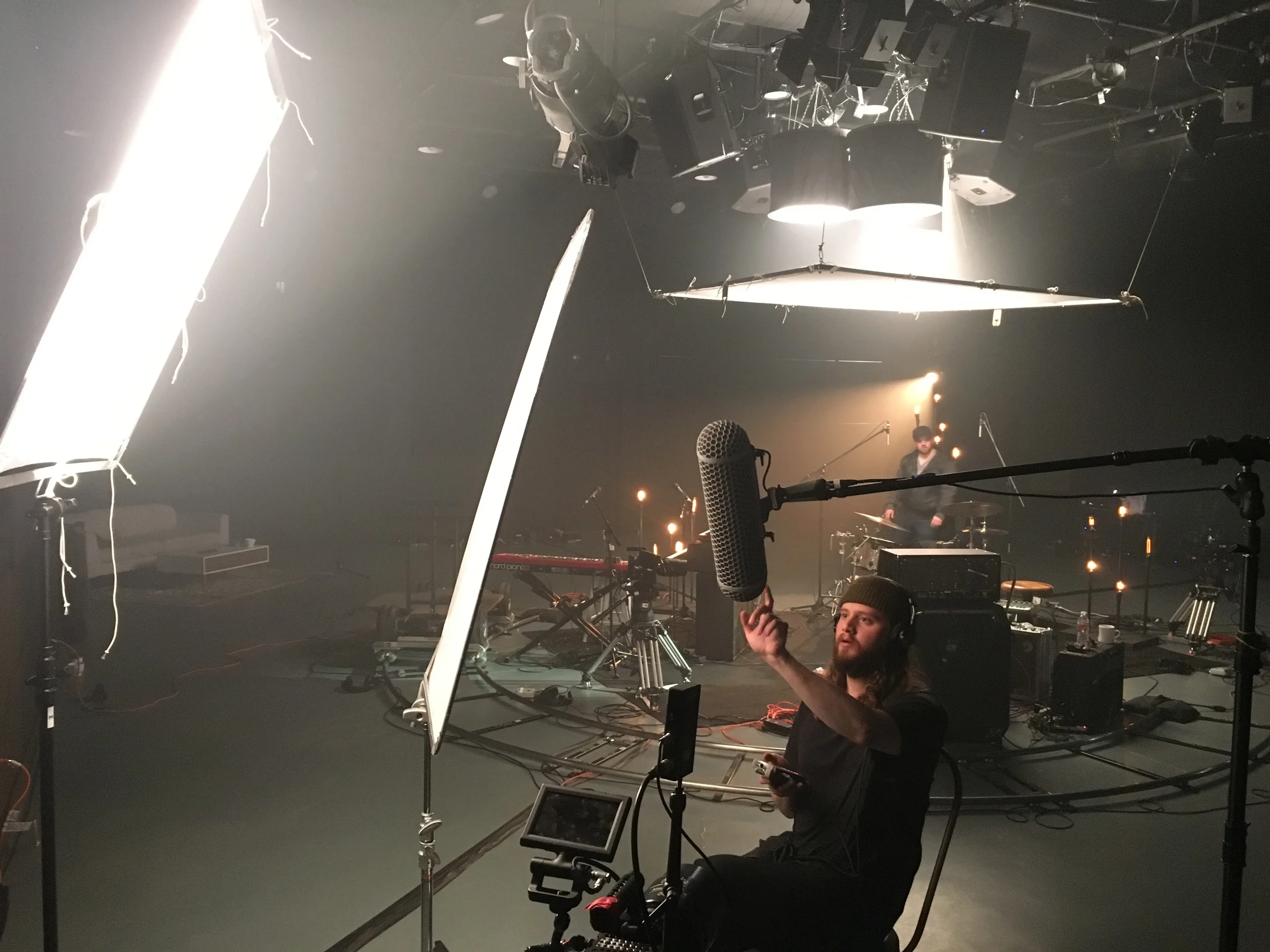 Producer Michael Leiato doing some serious sound checking for an interview.