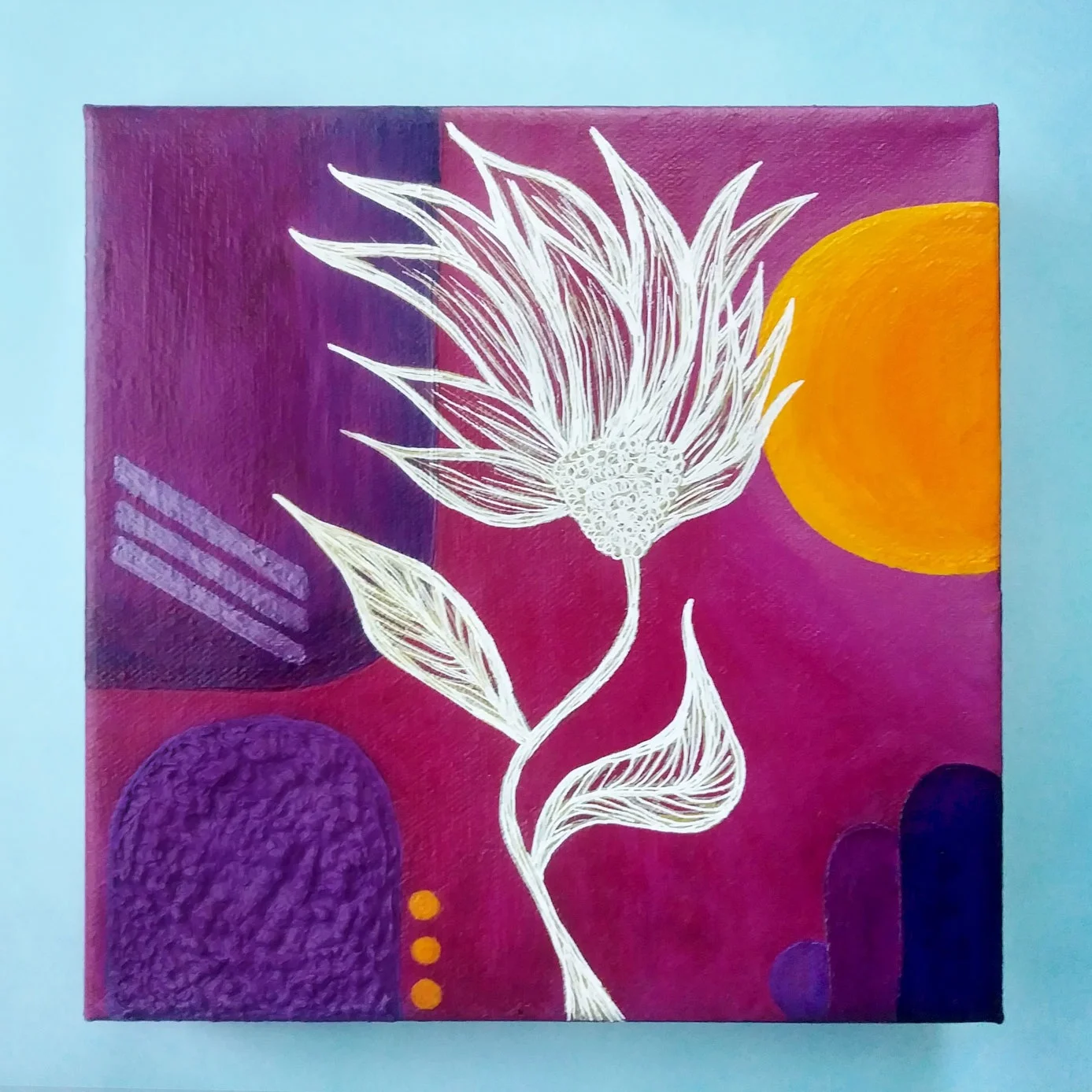 Original geometric floral painting The Warmth of the Sun by Effortlessly Eclectic. Pink, orange, & purple geometric shapes with a white & gold flower.