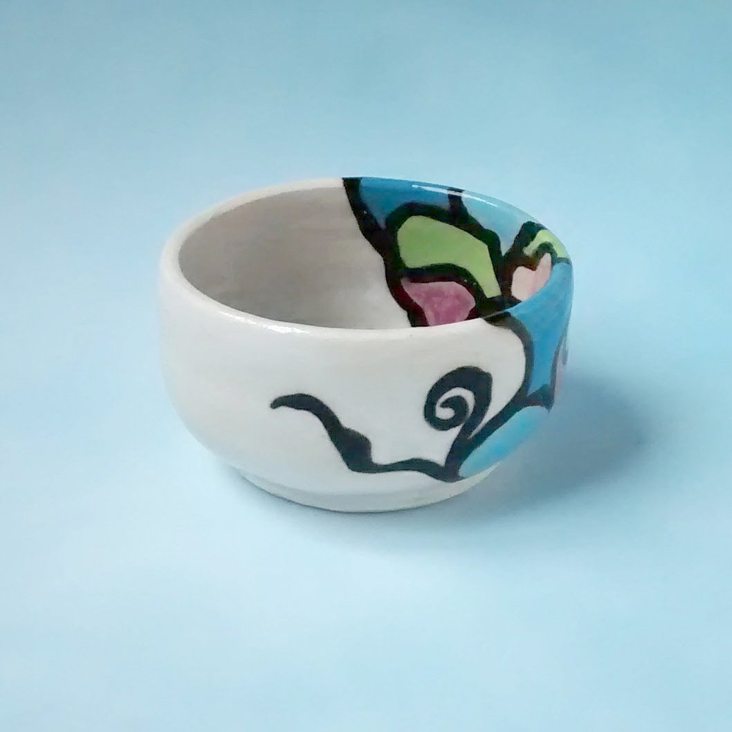 Colorful pottery. Small handmade bowl. Playful glazed design. Artful decor accent. Named: Color Play Bowl. By Stacey Taylor.