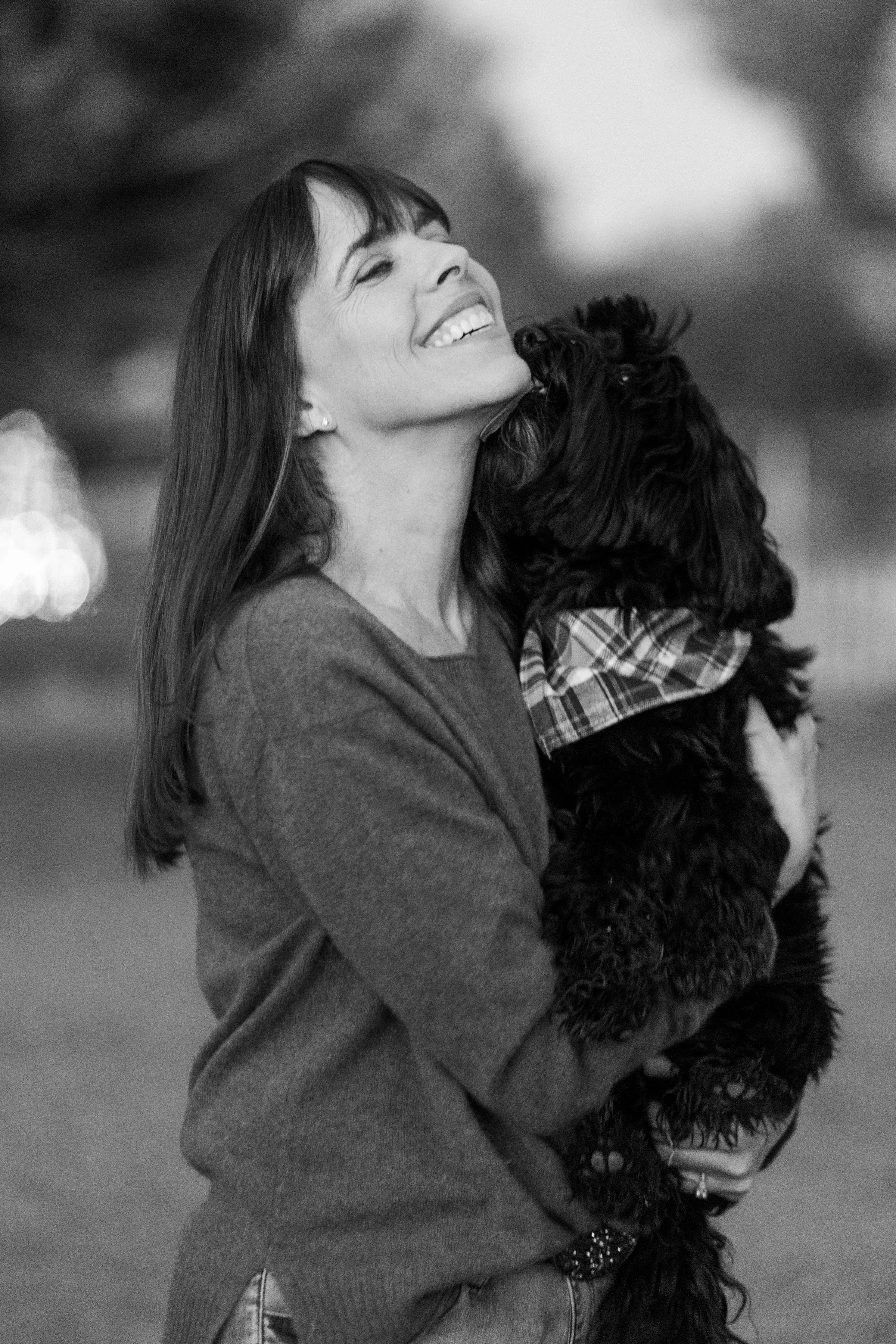 Jenn smiles holding jewel  b and w.jpg