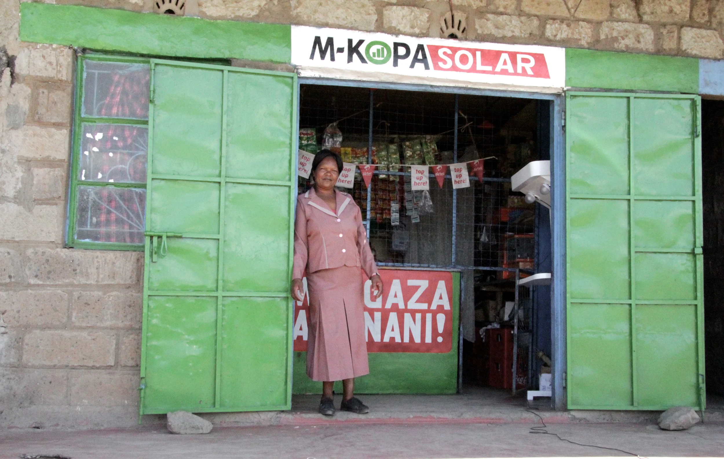 Selling M-Kopa panels at the rural village store