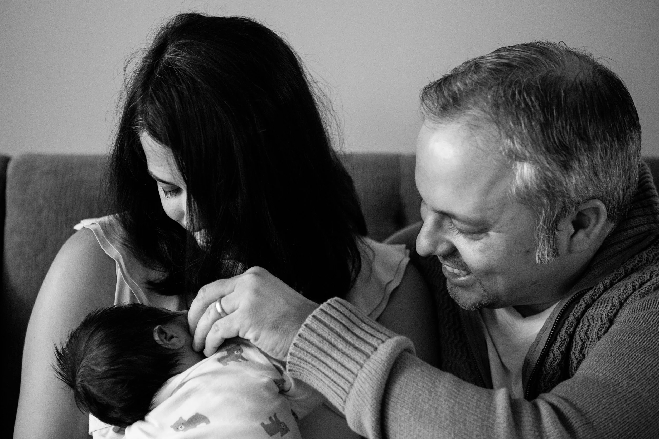 new parents with their newborn