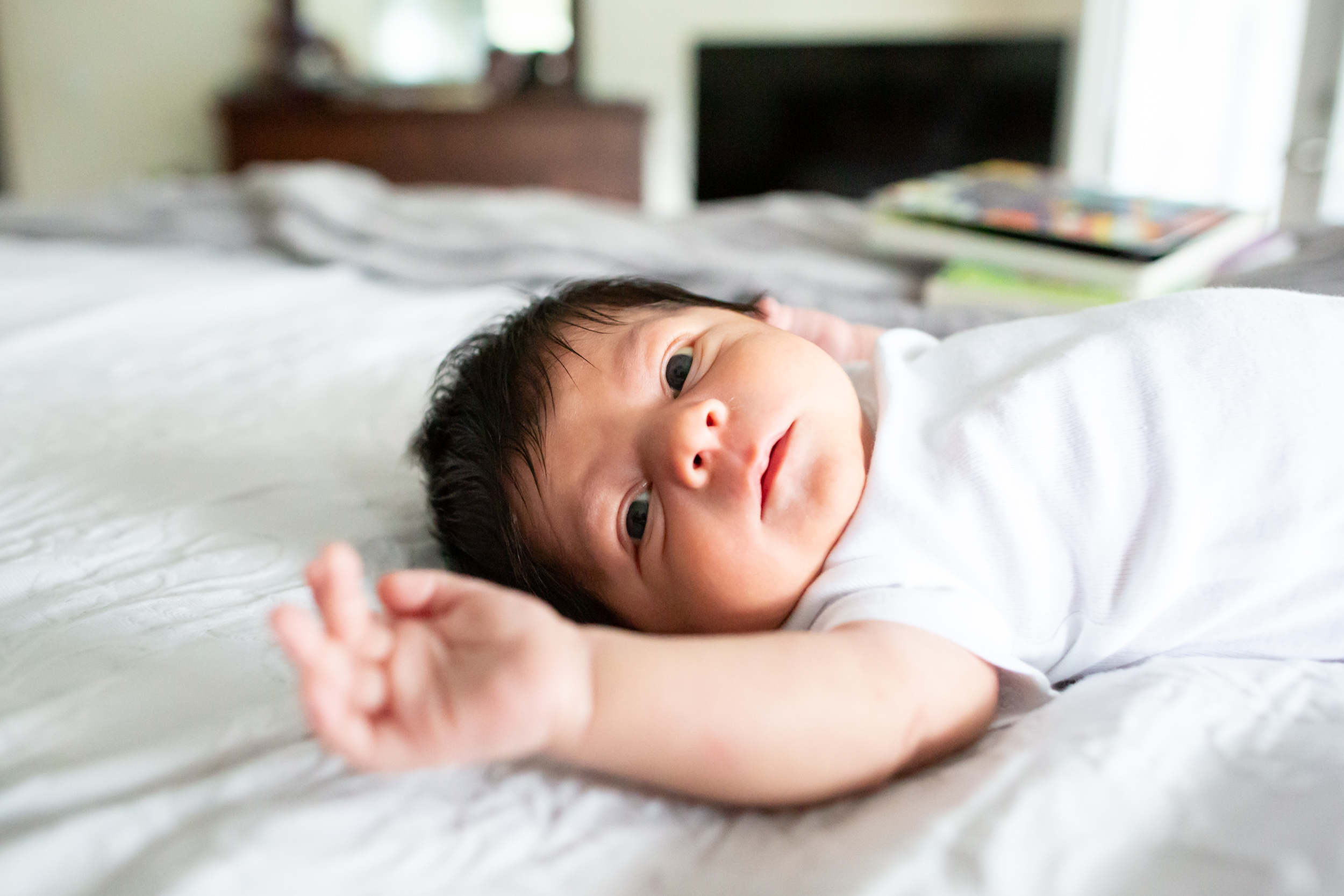 newborn baby laying down