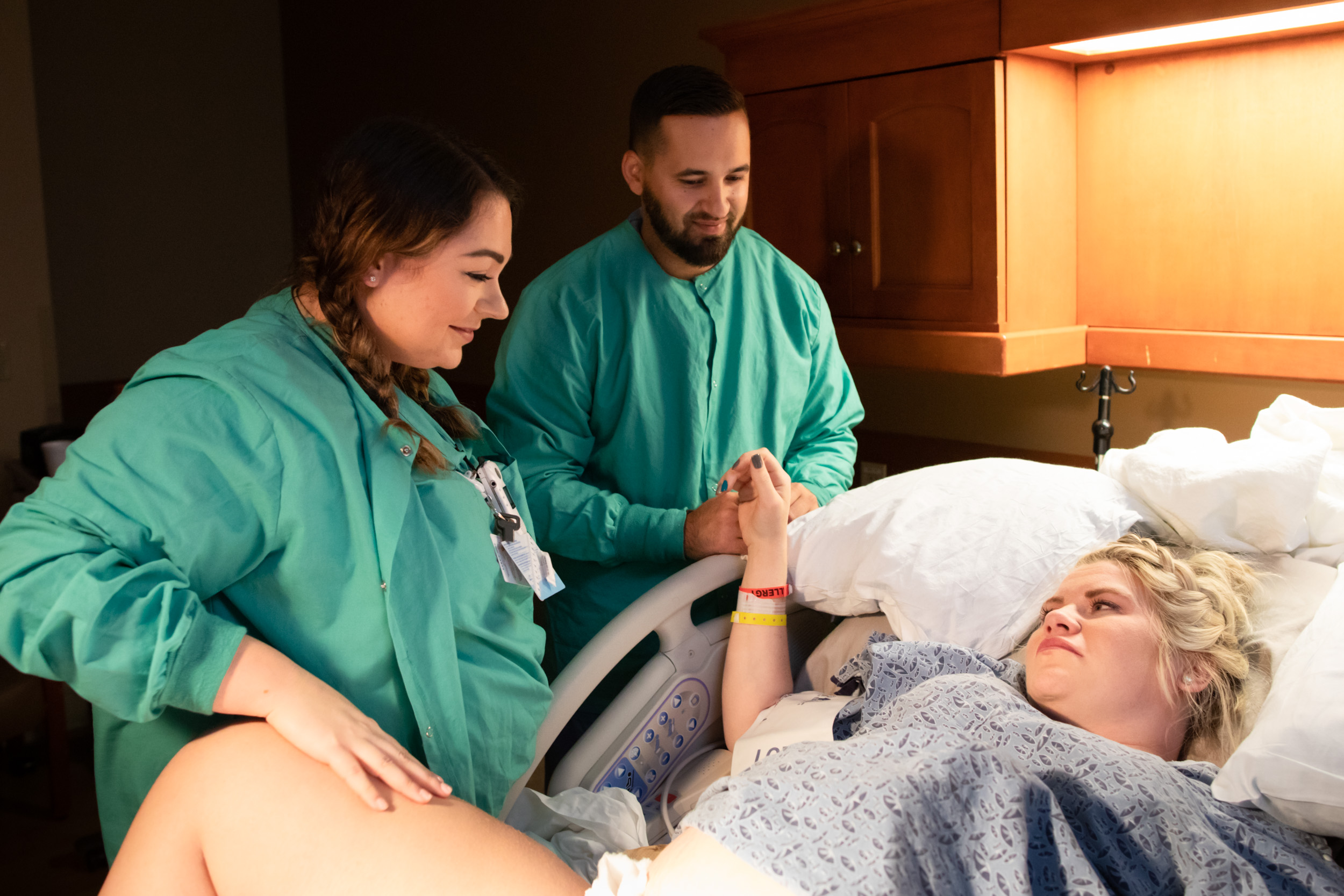 nurse and husband by laboring mom's side