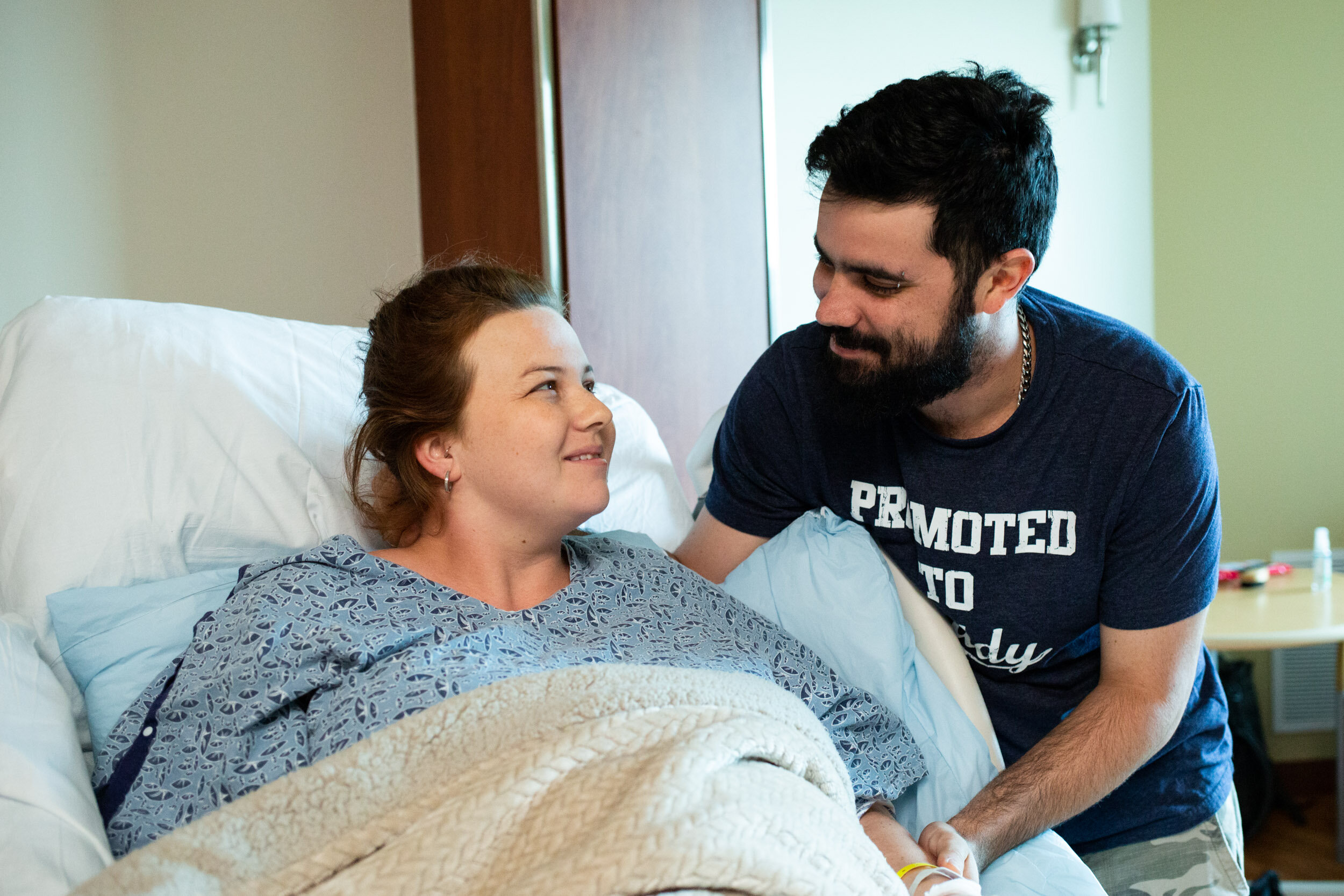 parents to be looking at each other sweetly