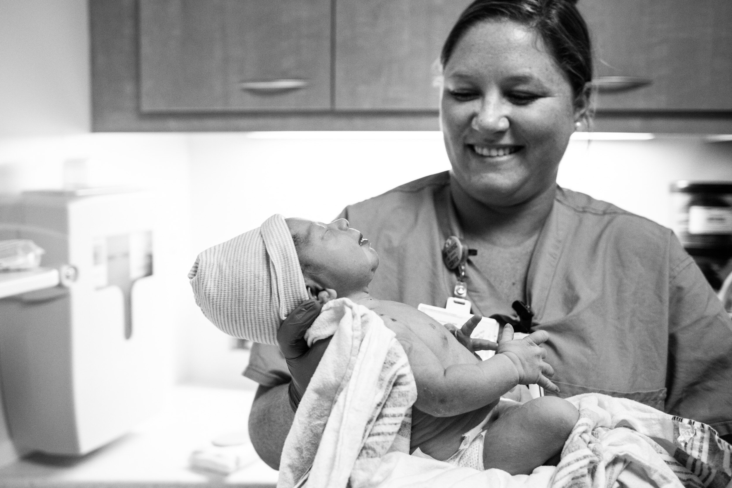 nurse holding baby boy