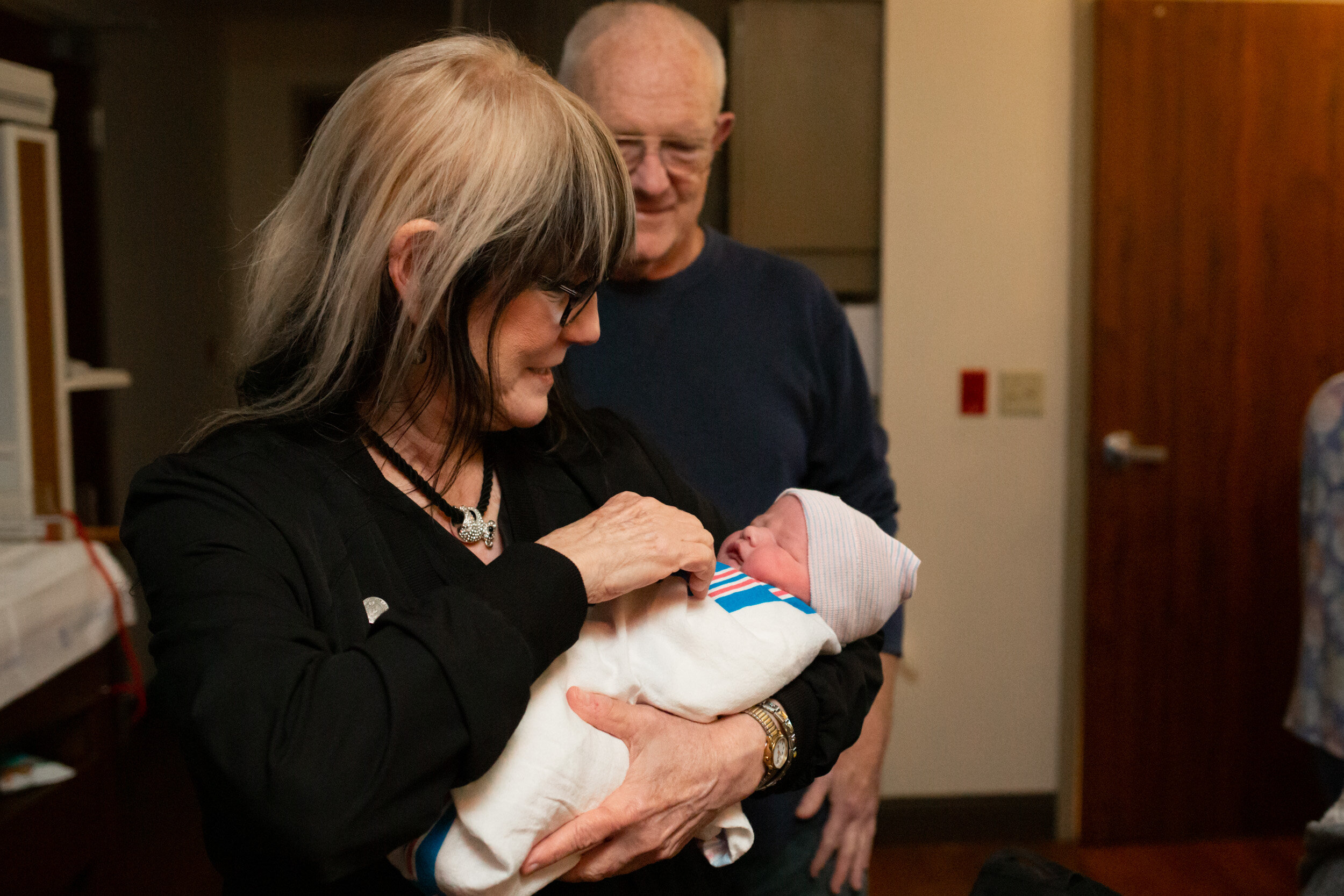 grandmother holding her newest grandson