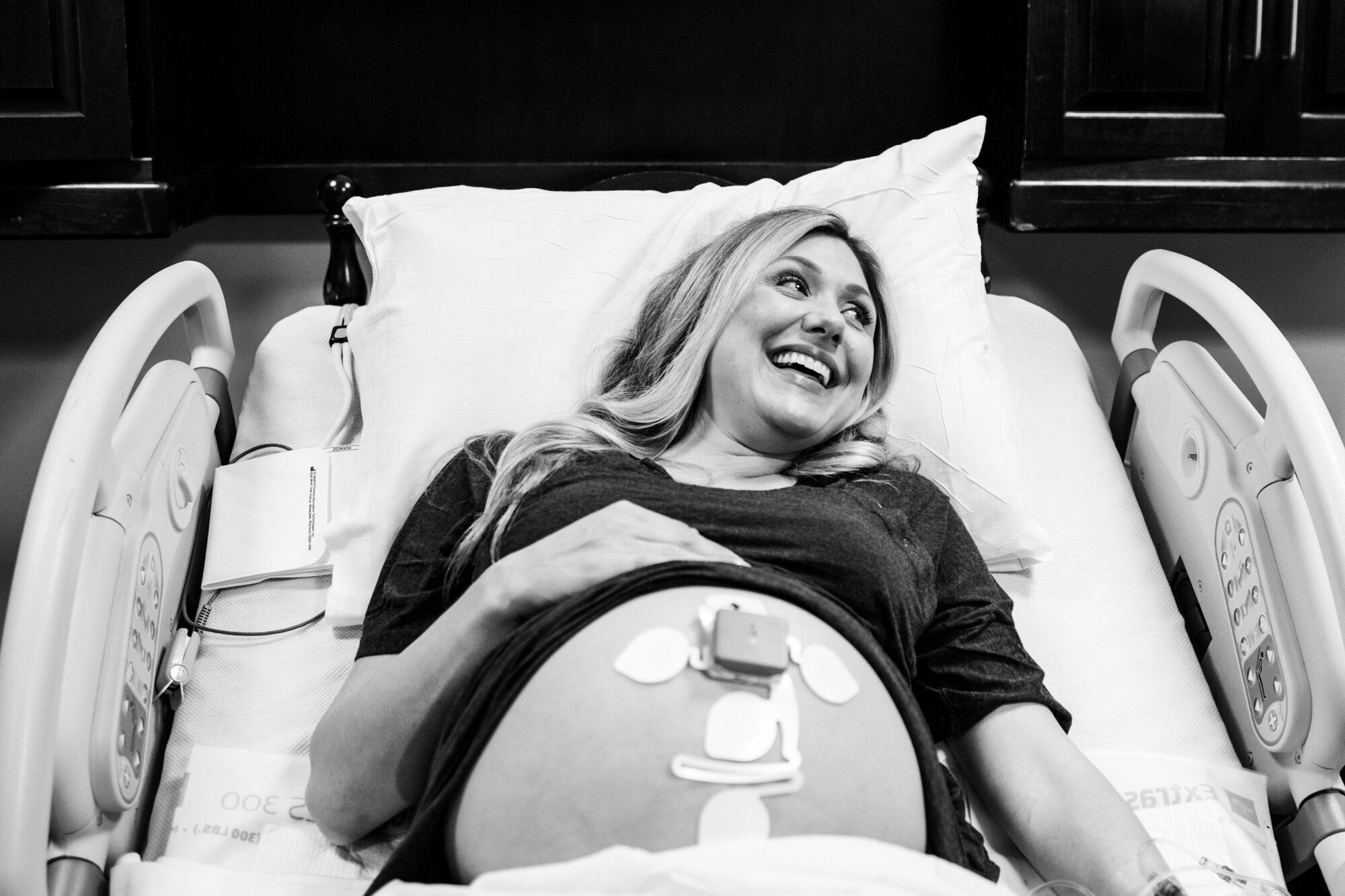 pregnant mom laughing in between contractions