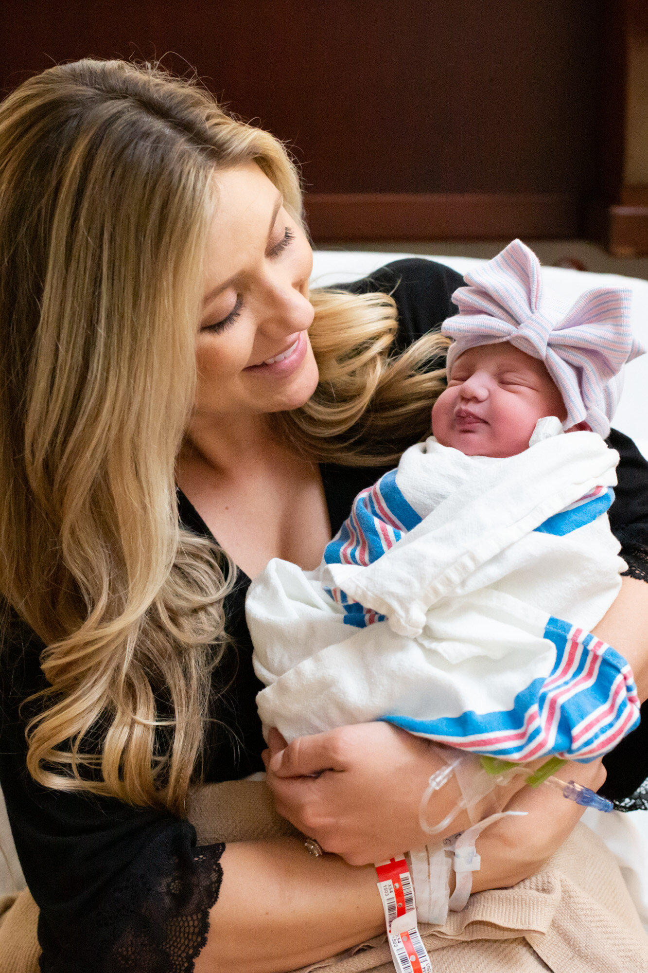 Jacksonville mom holding newborn baby girl