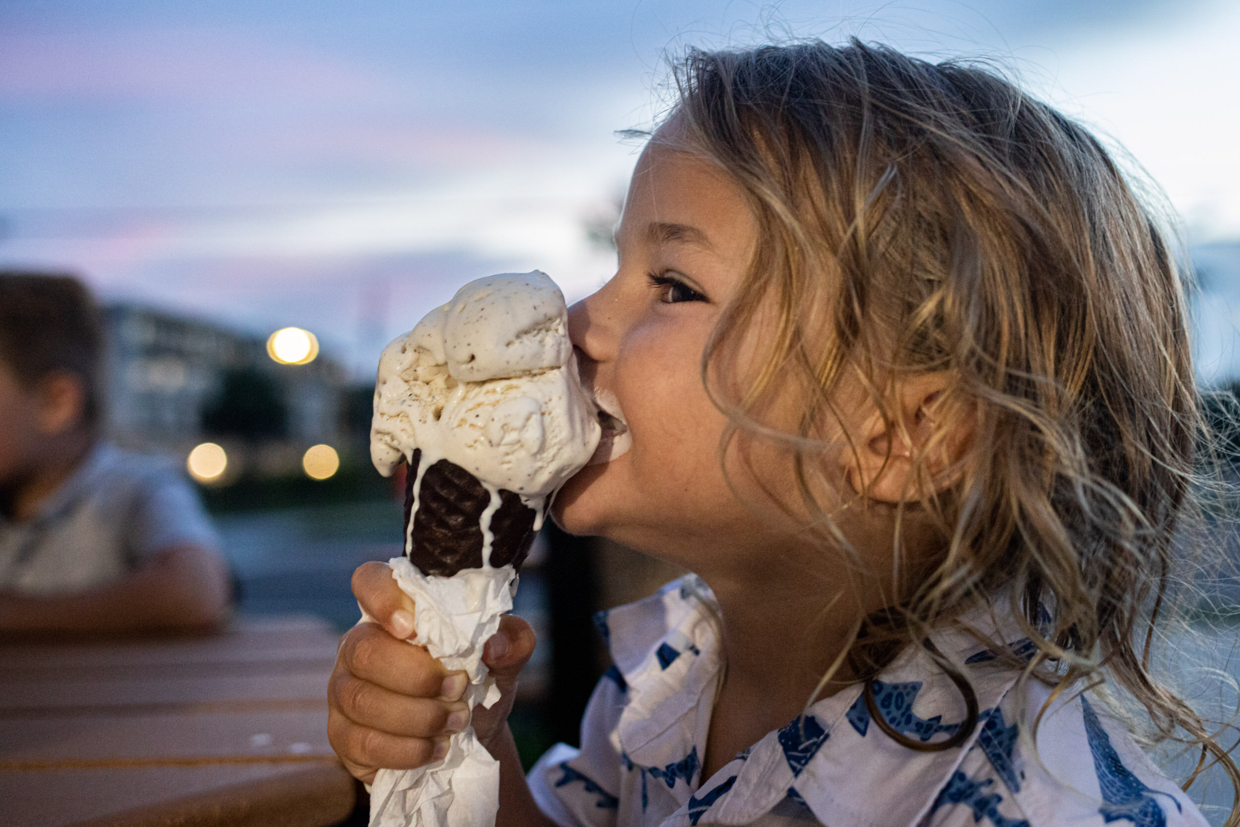 little boy indulging in his ice cream at cone heads ice cream, anastasia island
