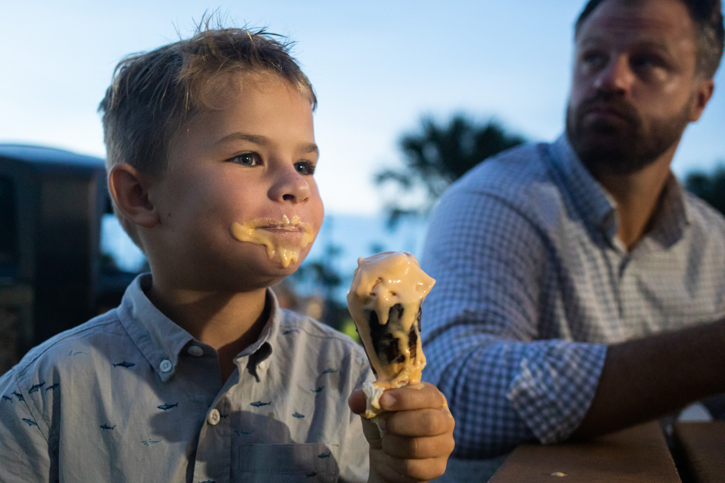 little boy with mouth covered in ice cream in st. augustine beach