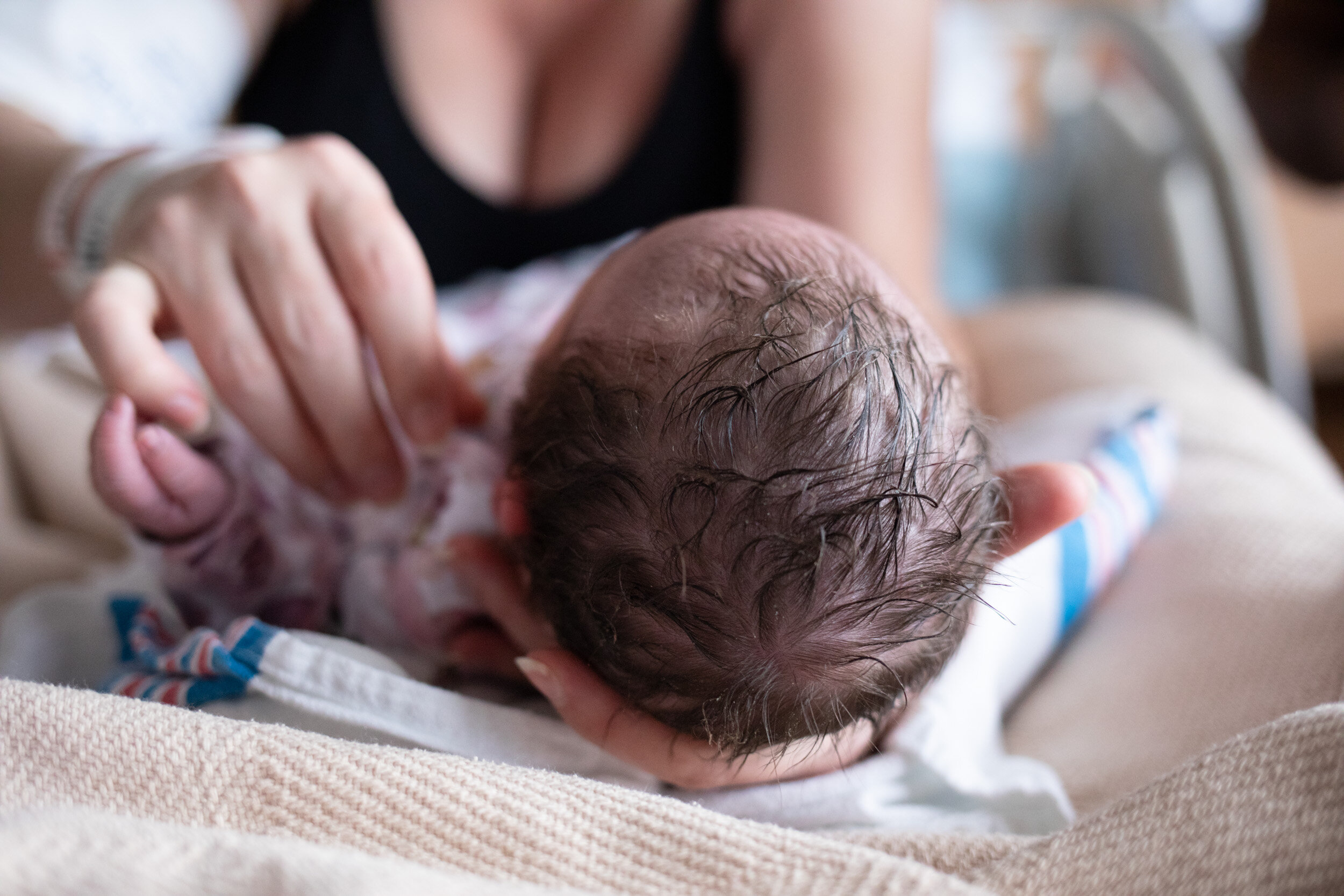 the texture of a newborn baby girl's hair