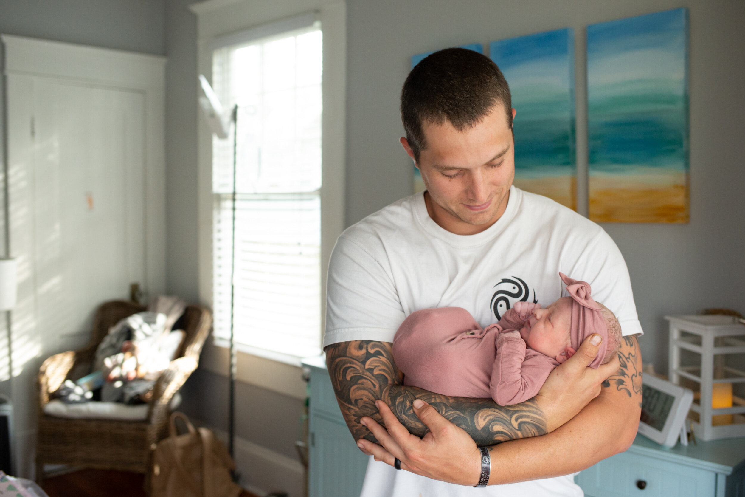 Jacksonville dad holding his baby girl