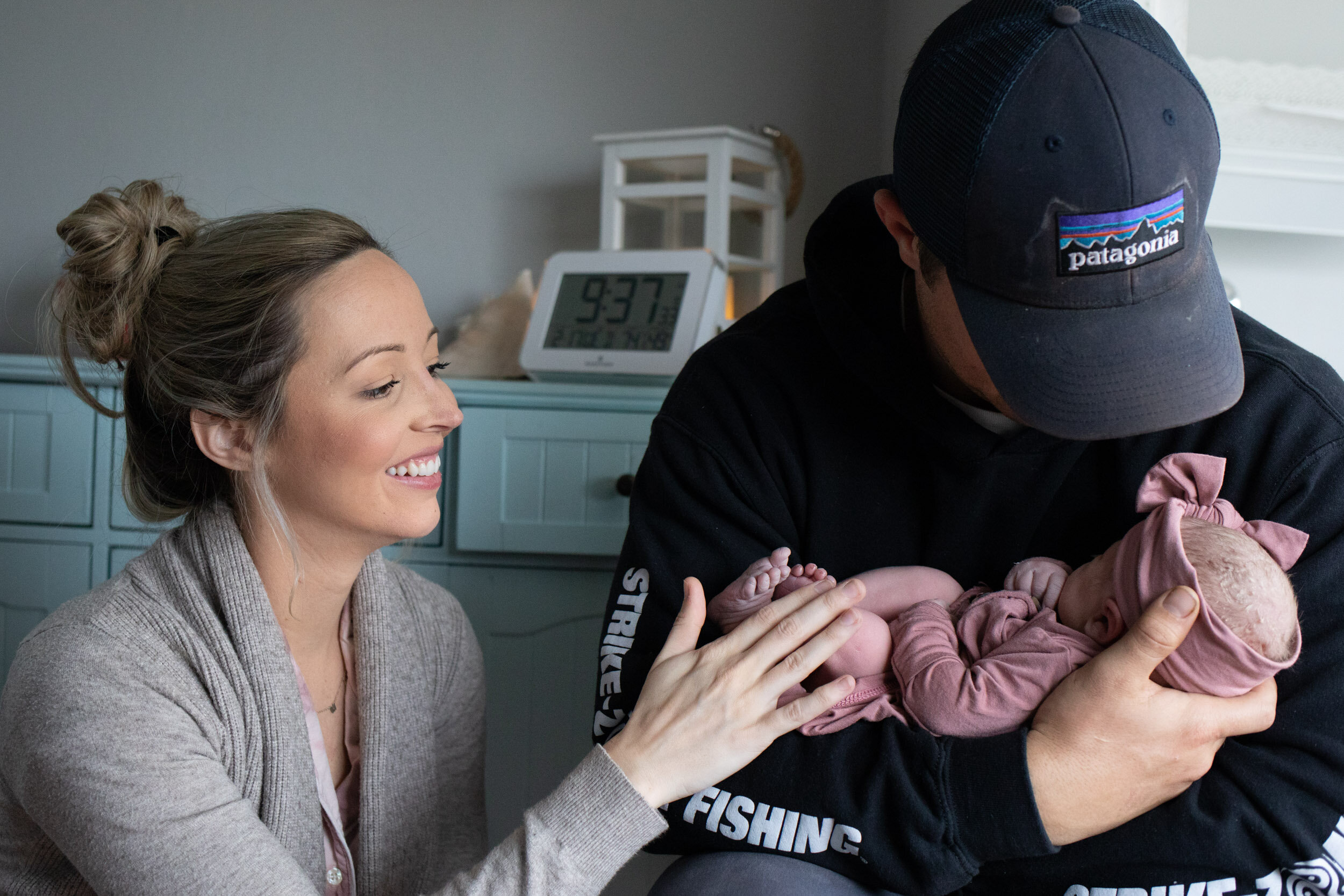 Mom and dad relishing in their baby girl just after birth