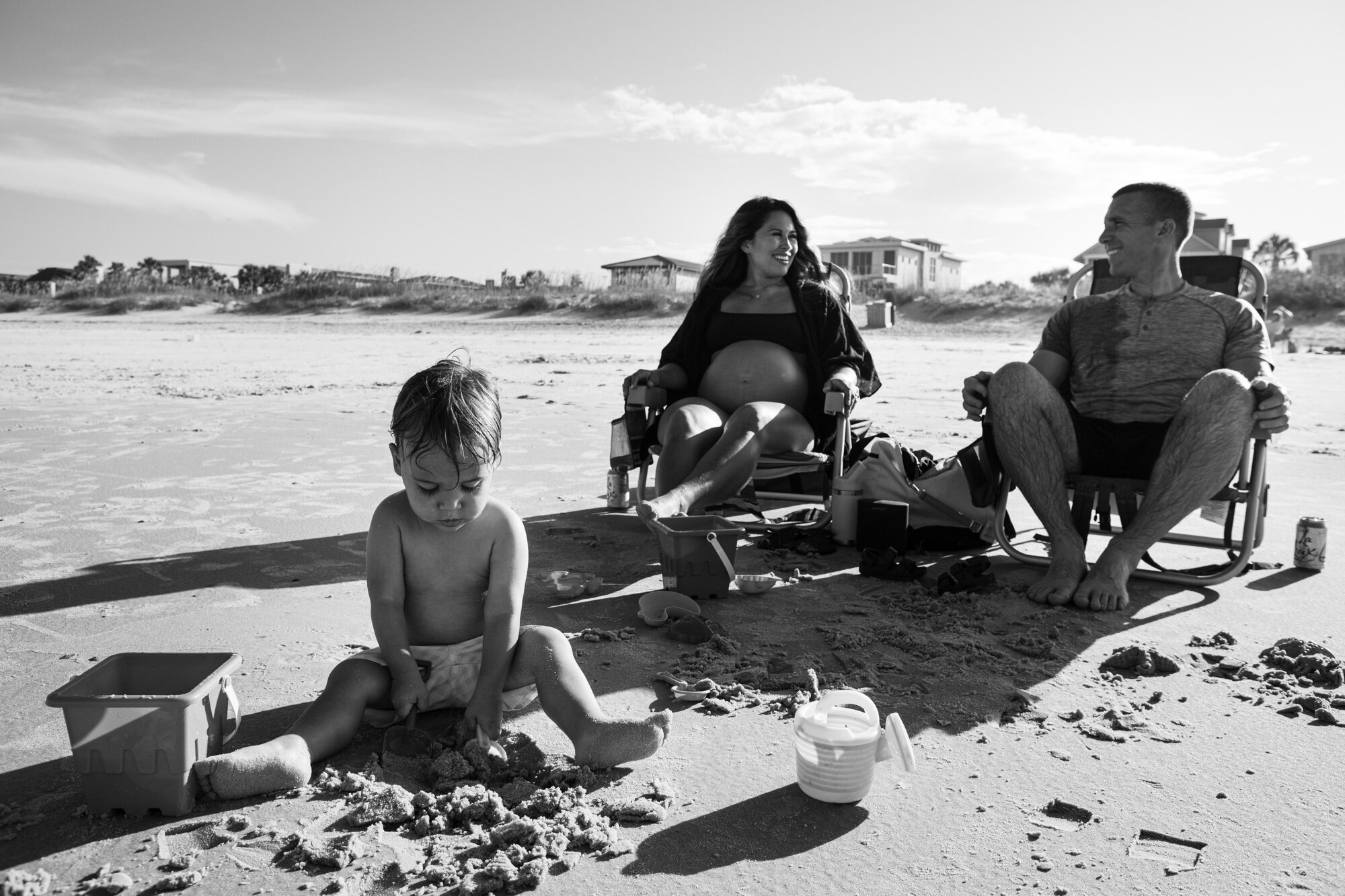 Jacksonville parents watching their son play on the beach