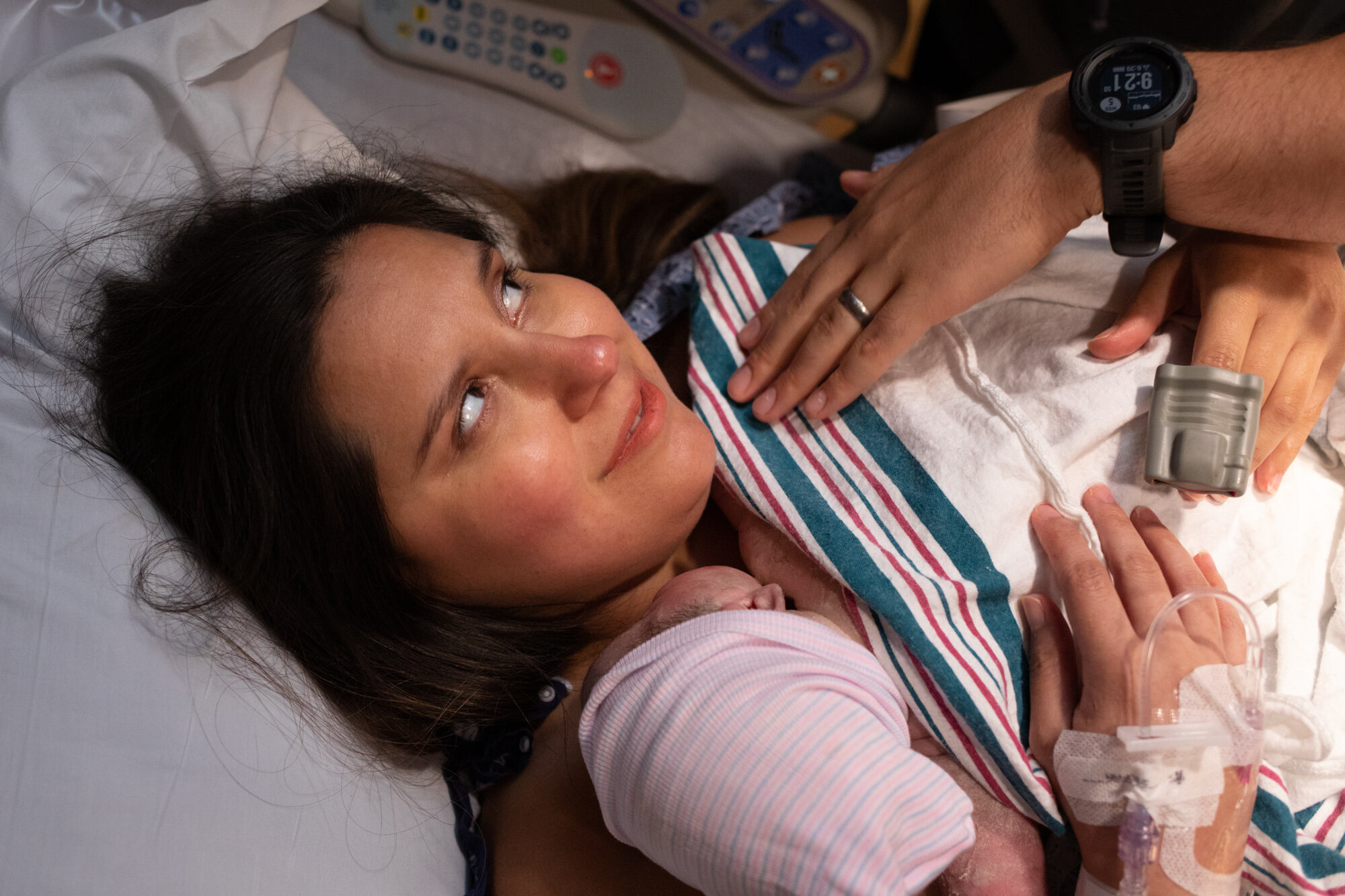 jacksonville mom looking at her husband just after birth