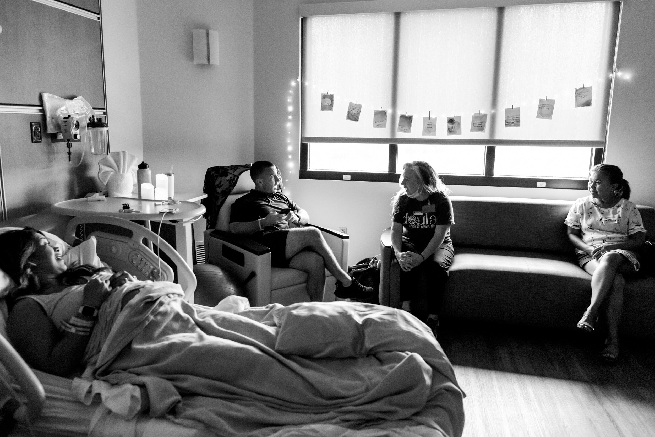 birth team chatting with mom in labor
