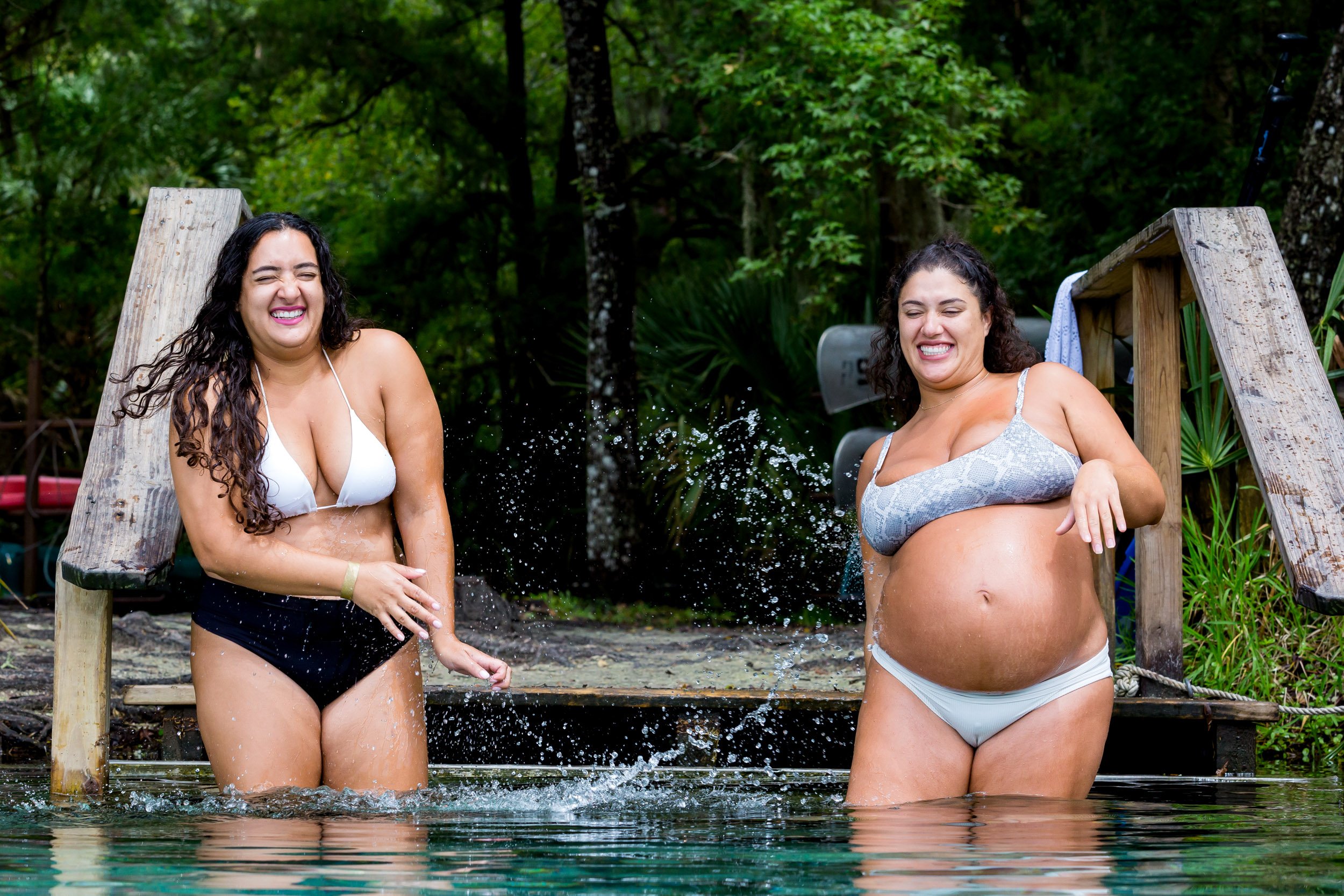 sisters splashing each other at silver glen springs