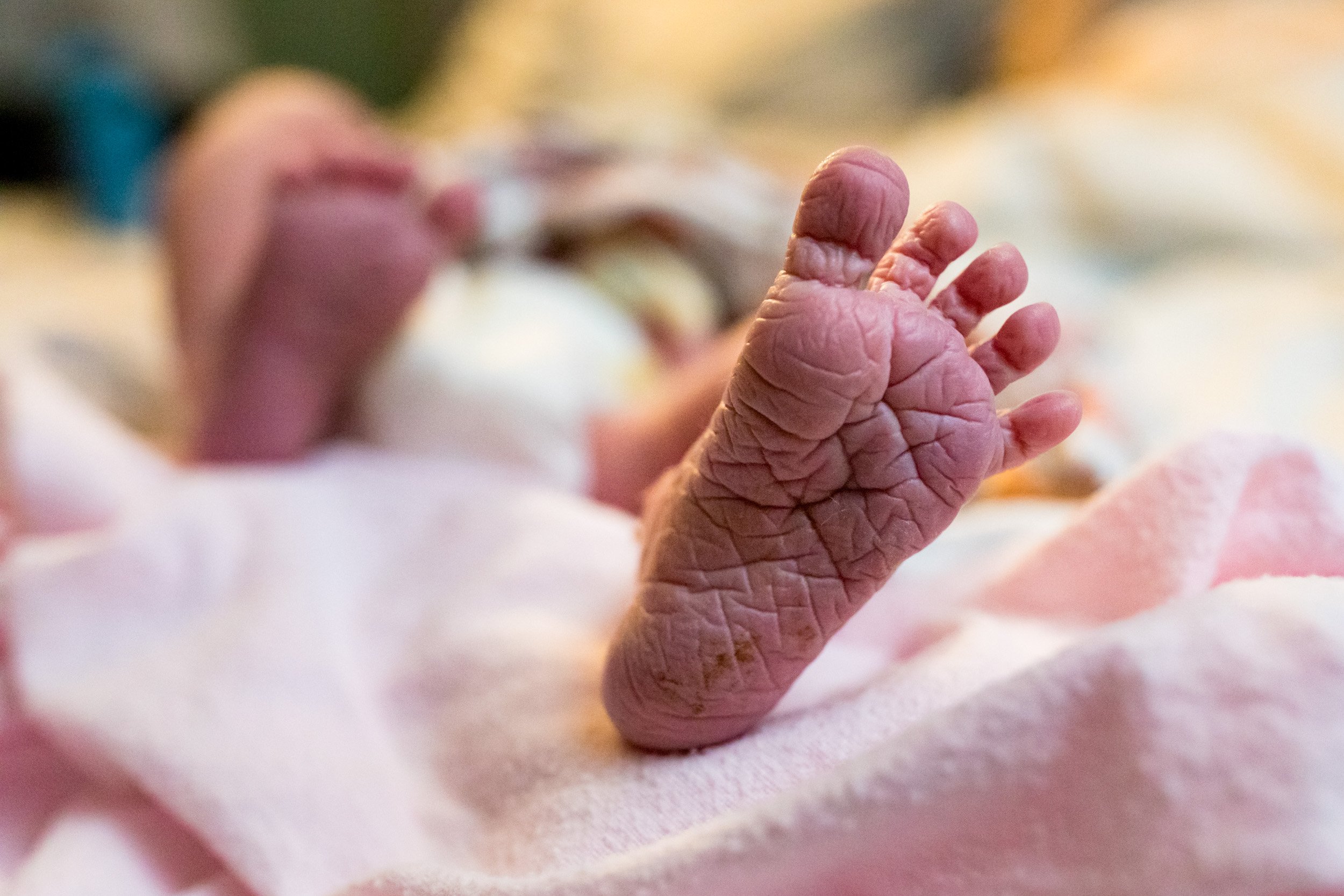 wrinkled newborn baby foot
