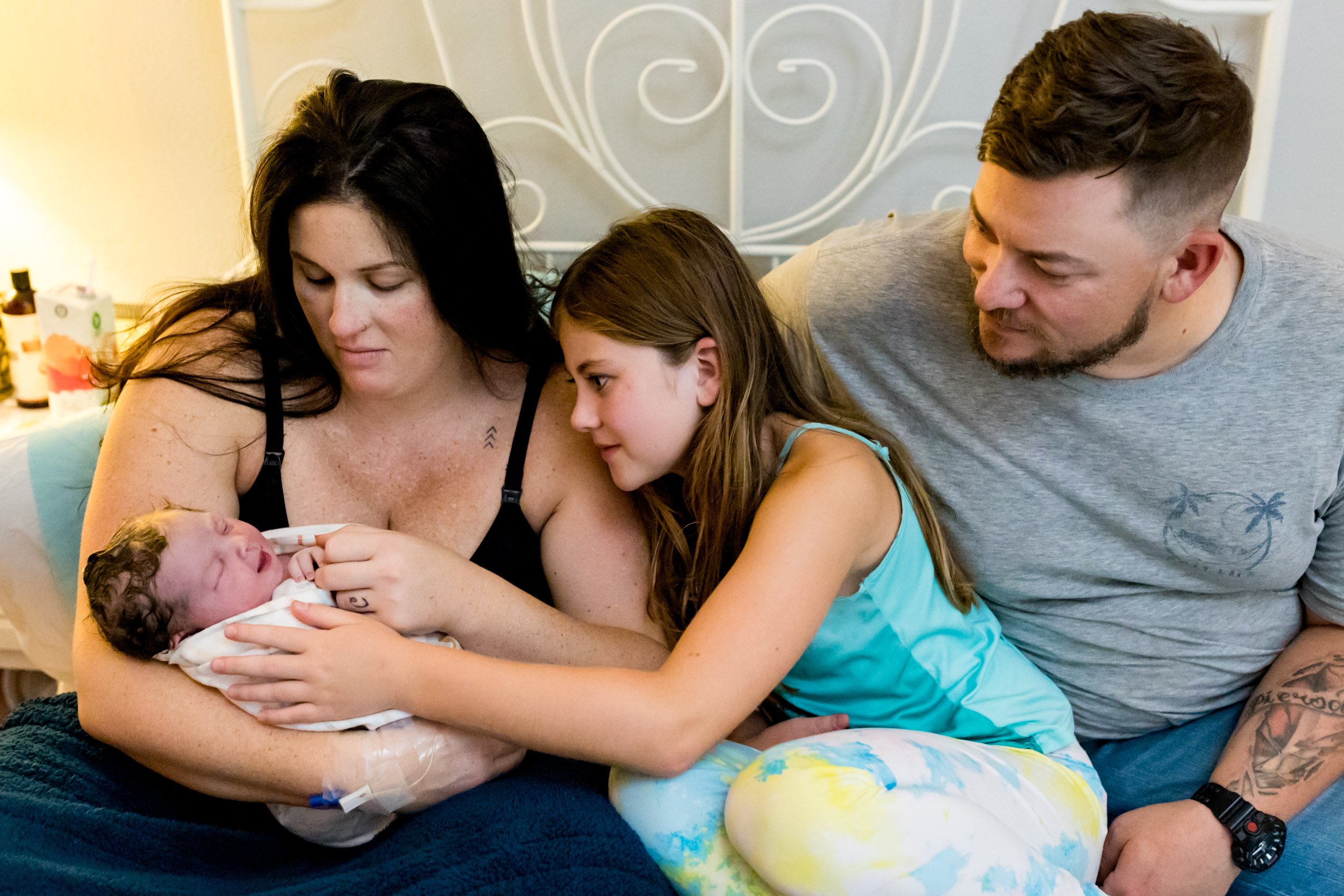 jacksonville family admiring newborn baby girl