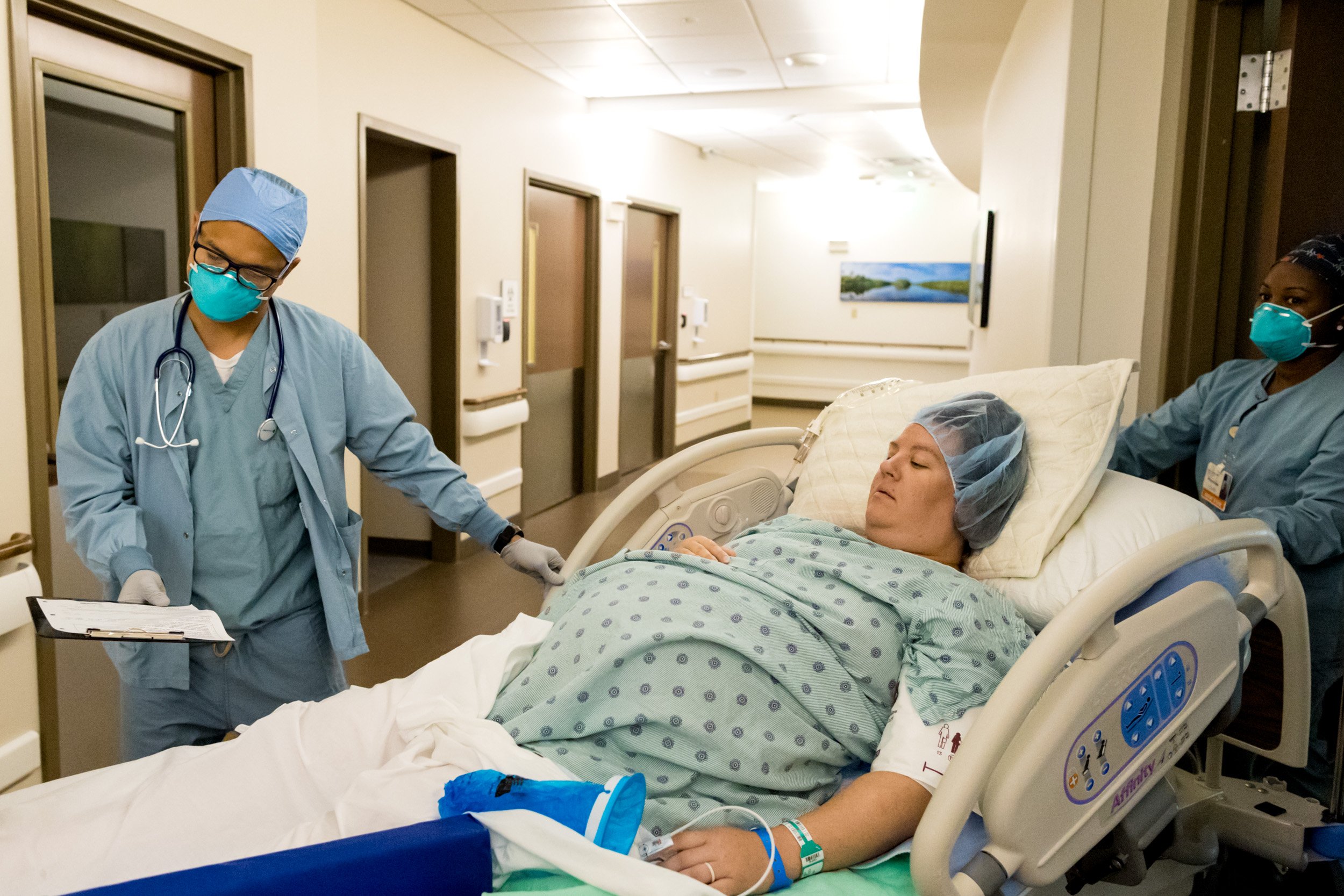 birth mom being rolled into the OR