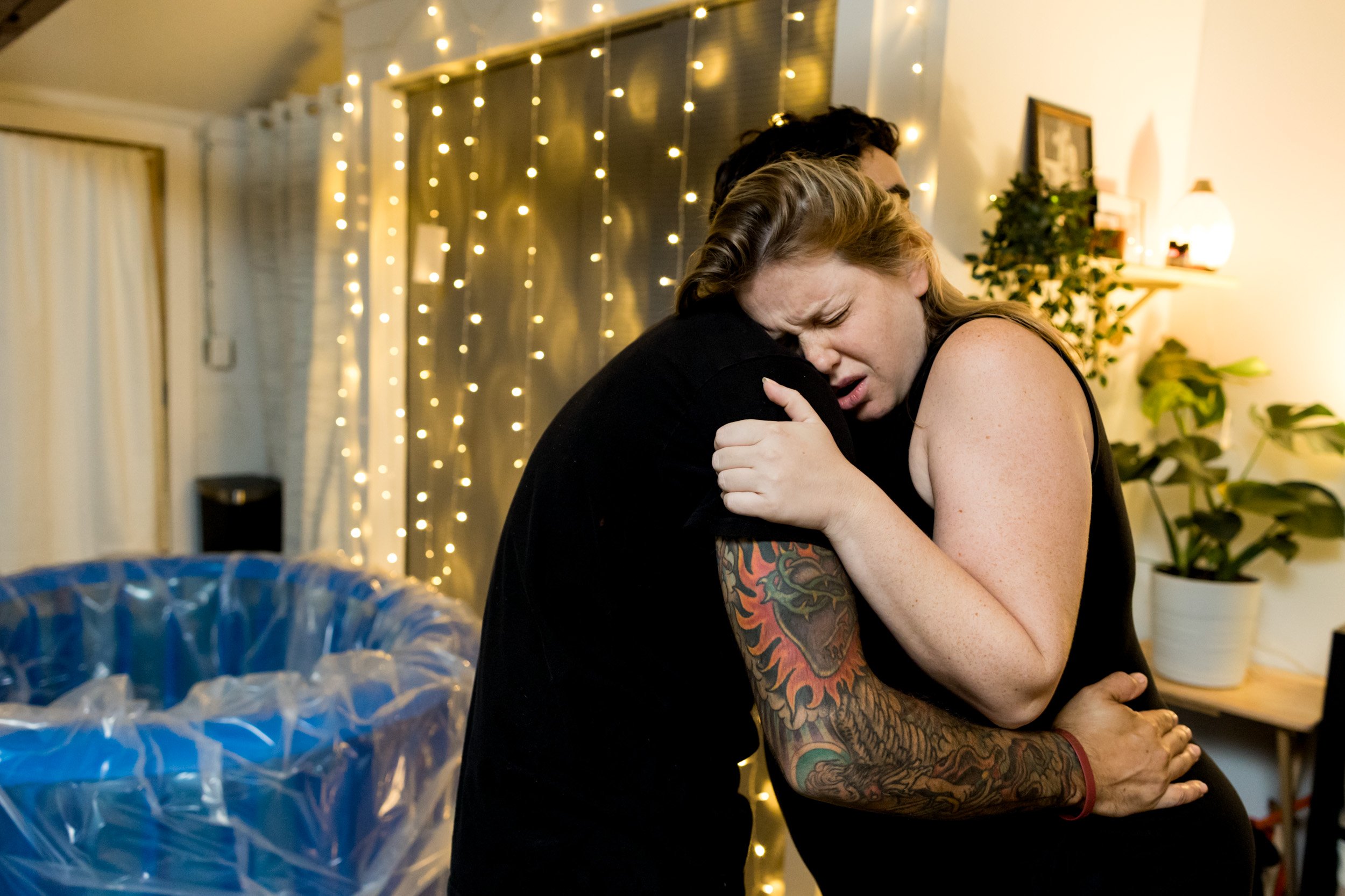 jacksonville birth mom in labor hugging husband