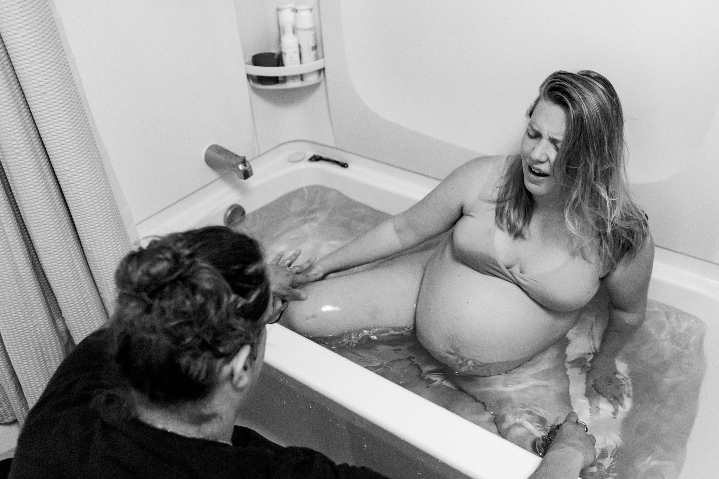 pregnant mom laboring in tub