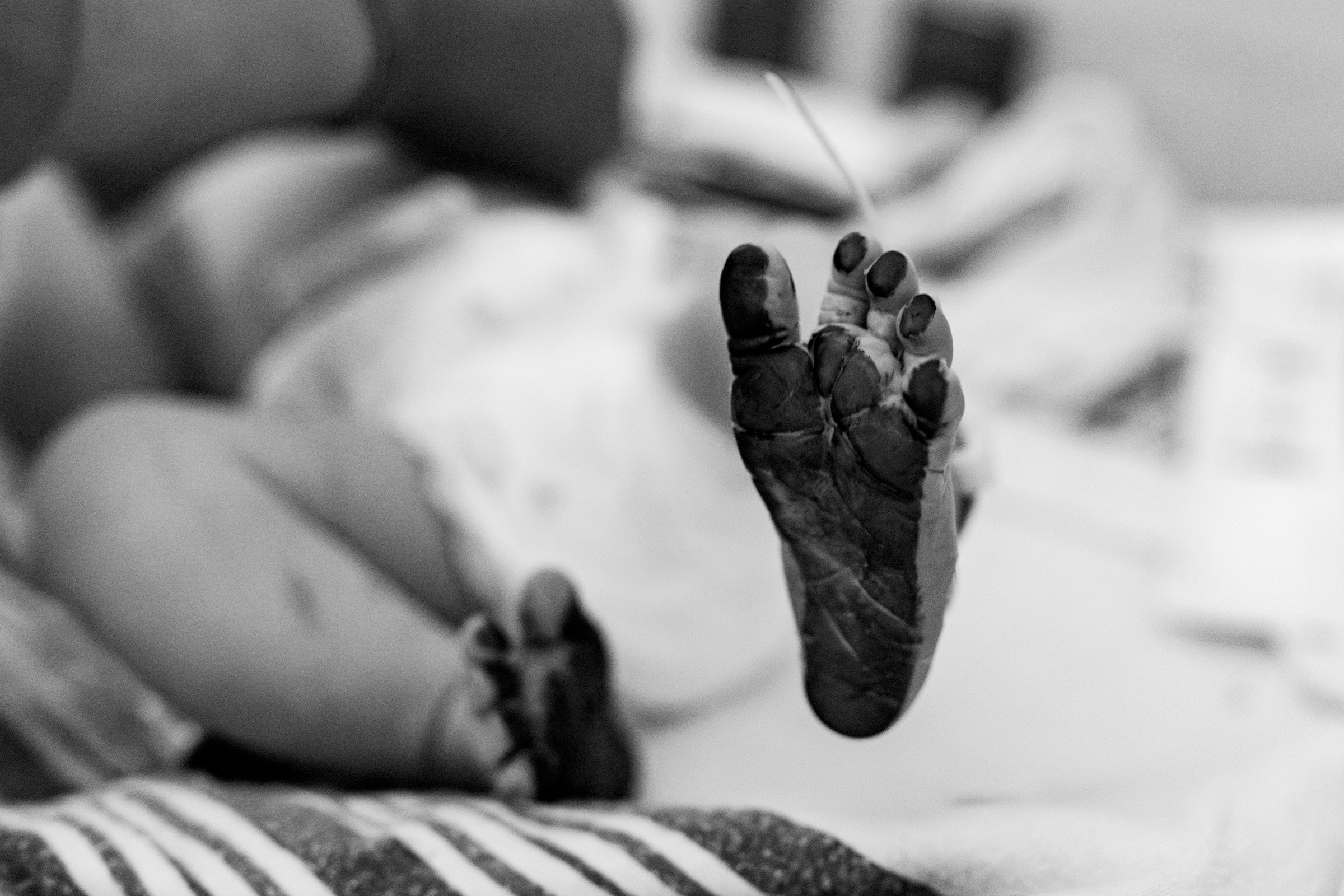 inky newborn baby feet