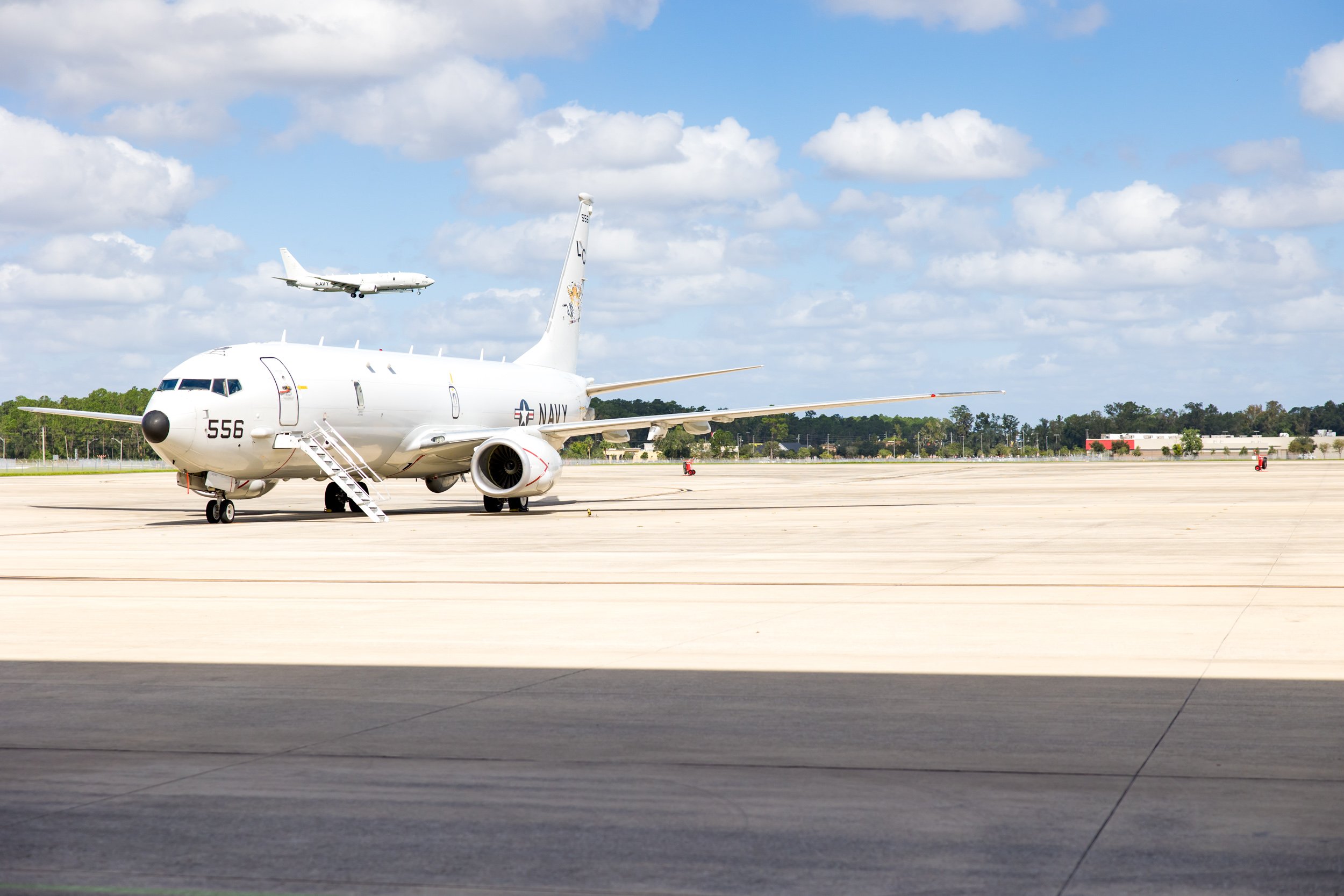 plane flying in for military homecoming at NAS Jax