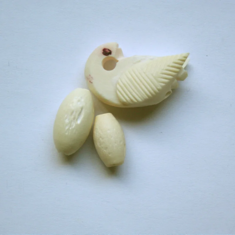 spkacademy_sitar_tuning_swan and oval_beads800.jpg