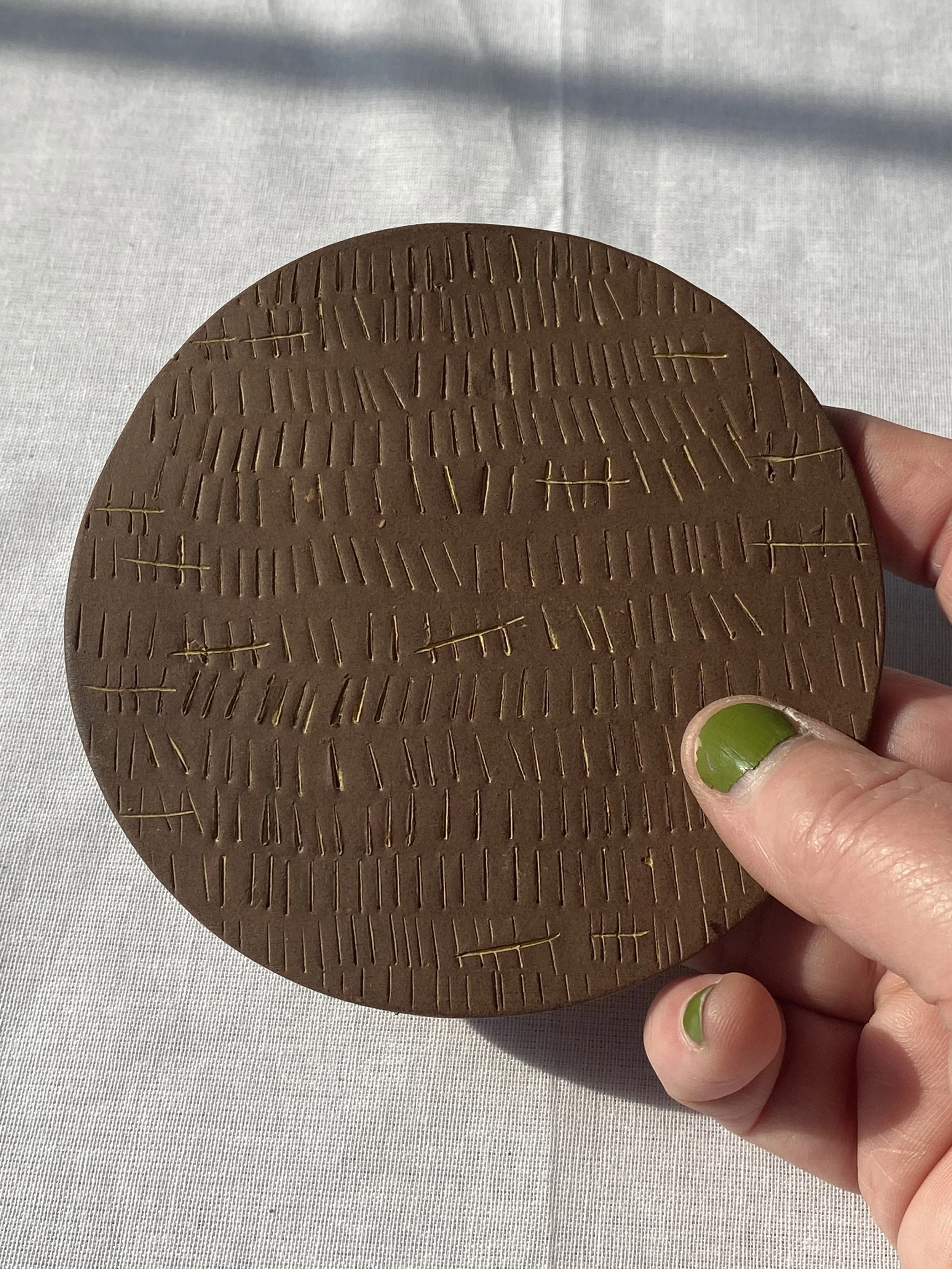 ceramic coaster yellow tally marks counting down the days sentence