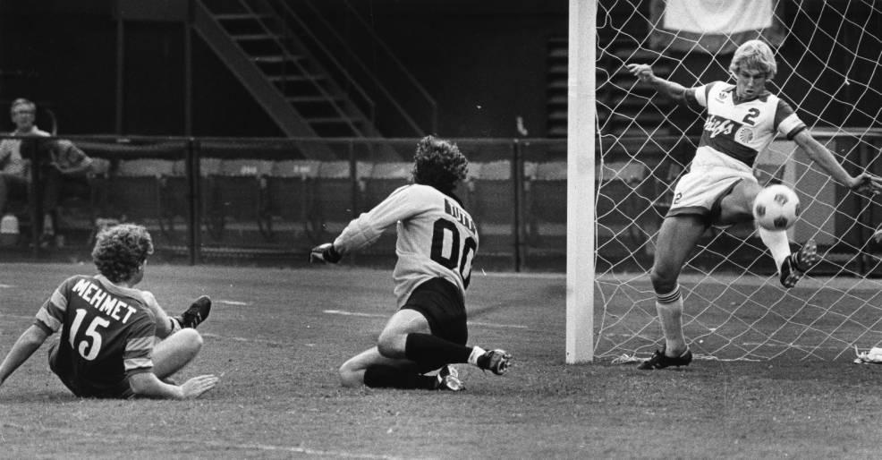 Chiefs Bruce Savage clears the ball in front of the goal against the Rowdies in 1981.jpg