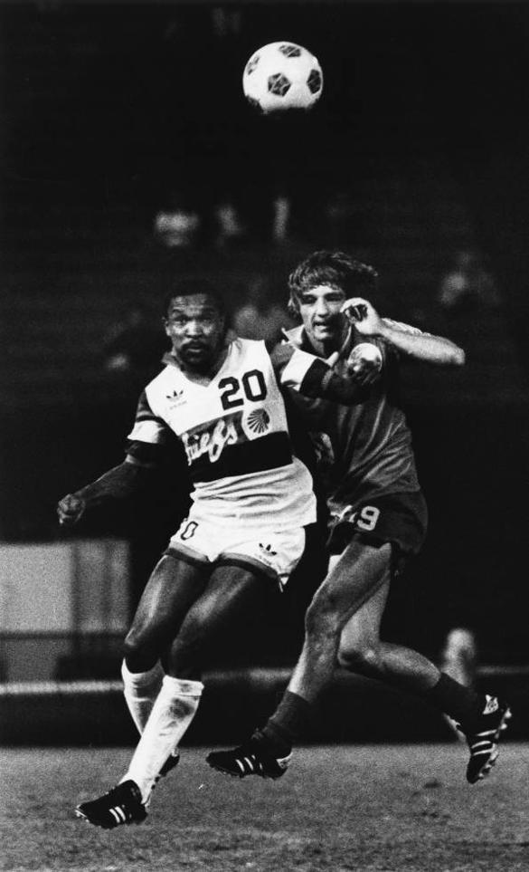Webster Lichaba left of the Chiefs and Nino Zec compete in a 1981 match.jpg