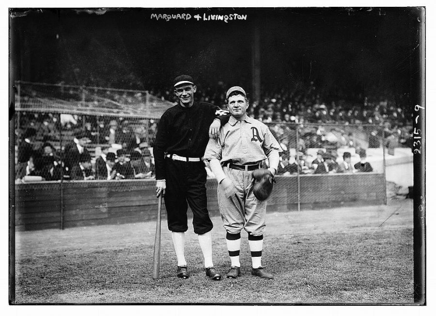 a-giants-player-and-an-as-player-pose-before-competing-in-the-1911-world-series.jpg