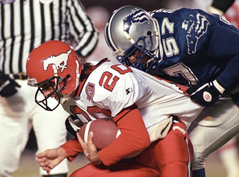 doug-flutie-and-o-j-brigance-during-the-1995-grey-cup.jpg