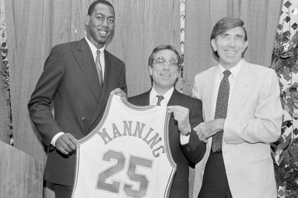 donald-sterling-center-and-then-head-coach-gene-shue-welcome-danny-manning-to-the-clippers-in-1988-600x398.jpeg