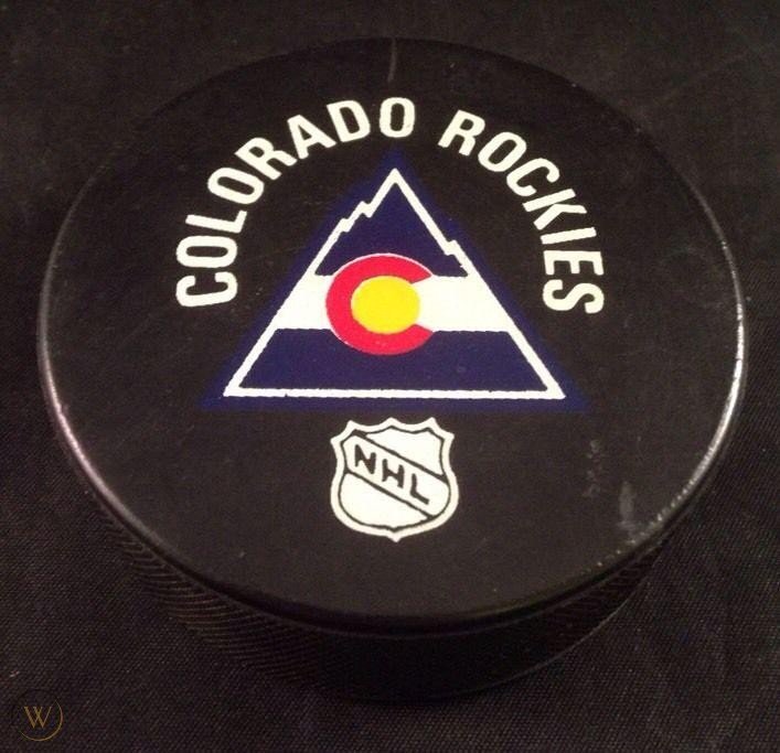 vintage-nhl-inglasco-puck-national_1_b11d2d4fca8b2c82e51c54cde8919c09.jpg