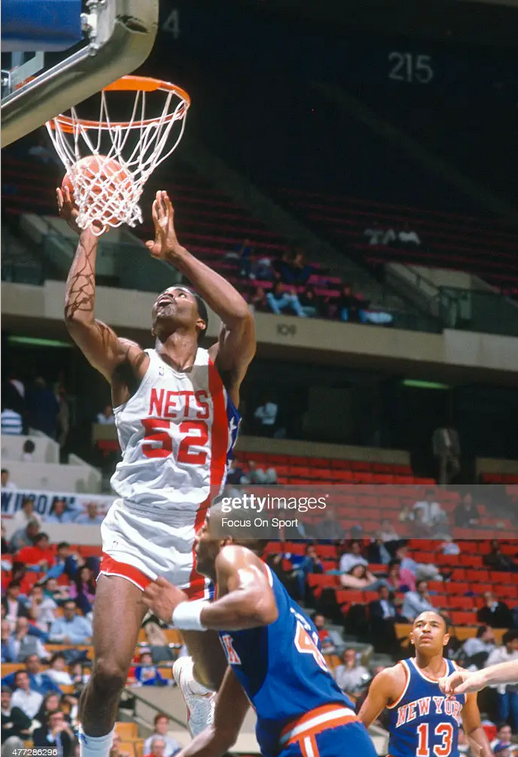 Screenshot 2023-01-15 at 20-44-19 Buck Williams of the New Jersey Nets goes up to shoot against the New.png