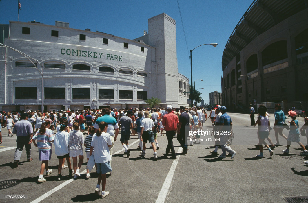 Screenshot 2023-04-23 at 21-29-33 Fans and spectators walk to the entrance of the Comiskey Park.png